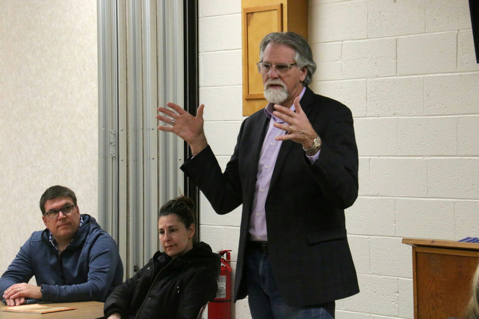 Deacon Steve Mitchell of Downriver Family 3 speaks to parents during a first reconciliation preparation class at St. Cyprian Parish in Riverview.