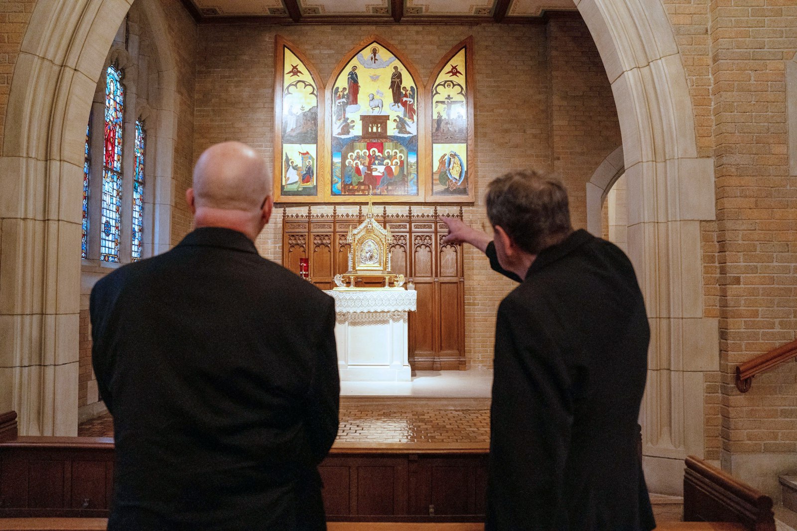 Archbishop-elect Weisenburger, left, and Archbishop Vigneron spend a few moments in prayer and reflection before the Blessed Sacrament in Sacred Heart Major Seminary's chapel before a press conference introducing Archbishop-elect Weisenburger as Detroit's sixth archbishop.