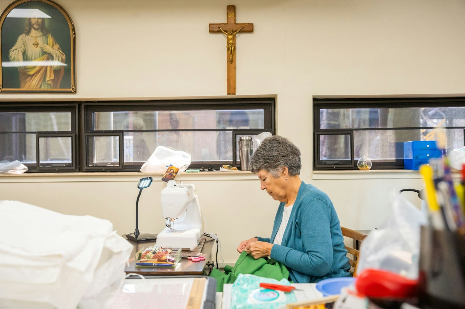 Madeline Balice sews a chausible in the sewing room at St. Bonaventure Monastery. The century-old Eucharistic Mission Band, which started in Detroit in 1917, has seen membership ebb and flow over the years. Currently, six women meet weekly to sew vestments, but occasionally complete special order projects for the Capuchins.