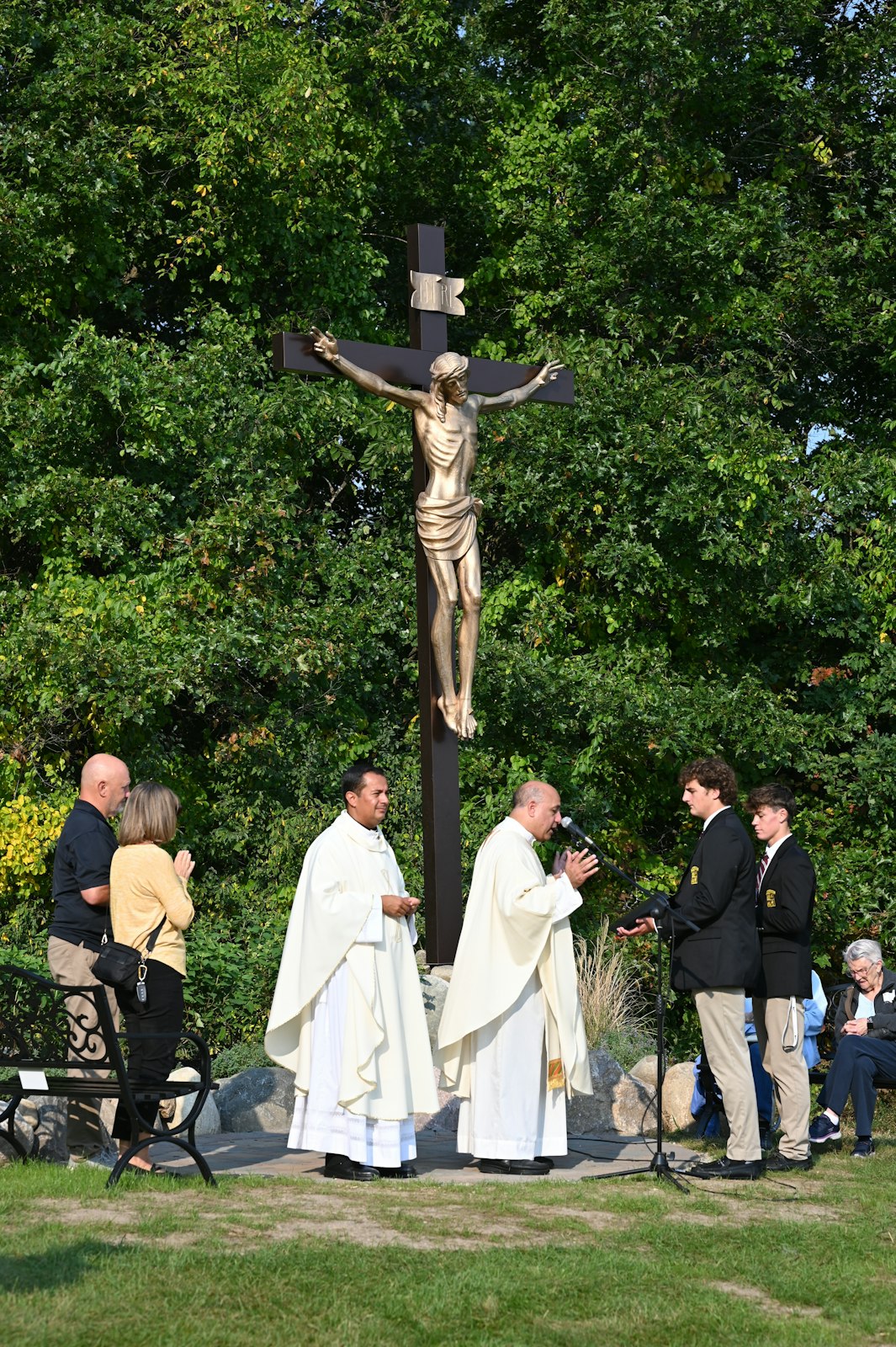 The Christ the King Shrine is dedicated before the Everest Collegiate-Our Lady of the Lakes football game on Oct. 13. The crucifix was donated by an anonymous donor.