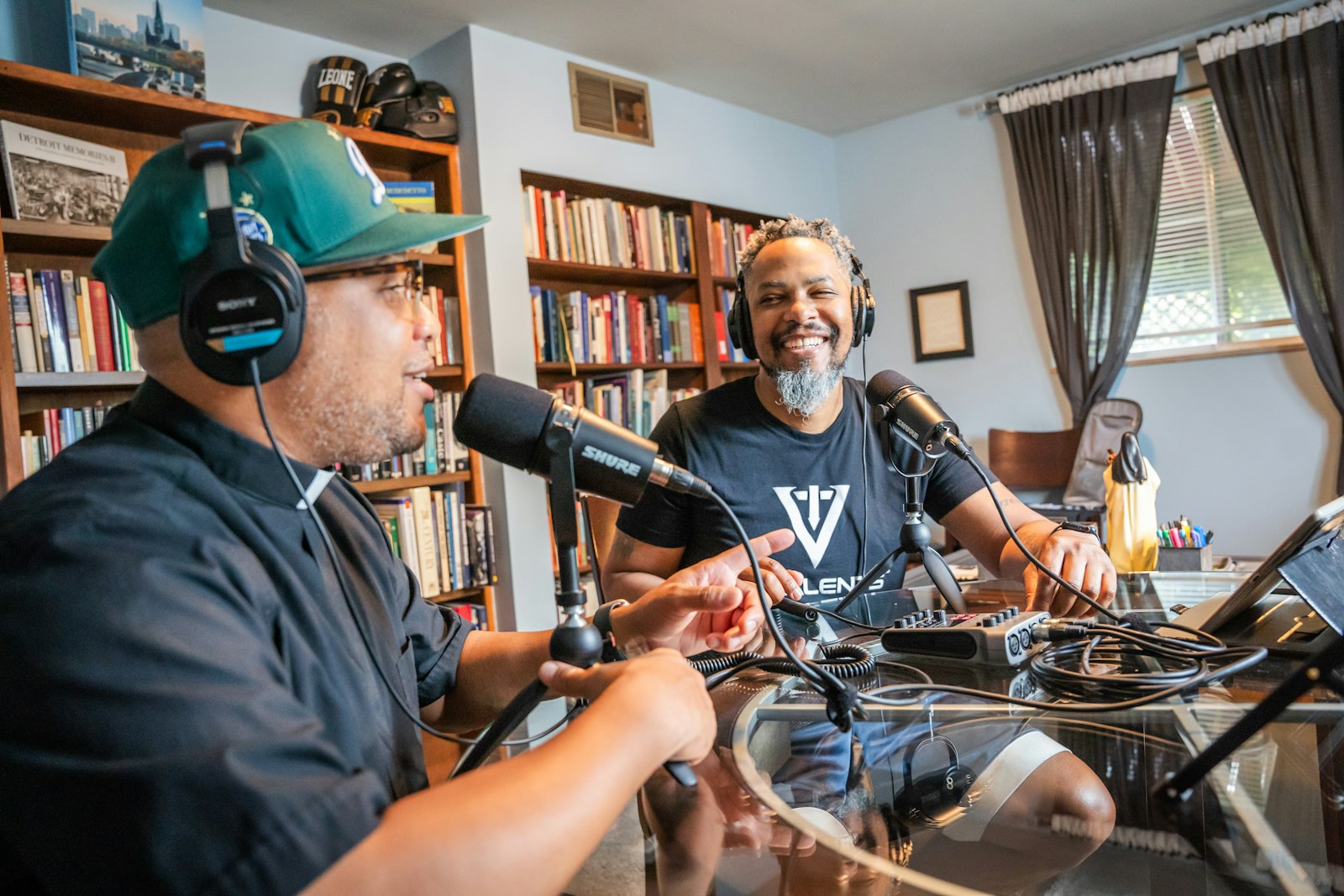 Fr. McKenzie and Smith record an episode in Fr. McKenzie's office at Christ the King Parish in Detroit. The podcast's tone is down to earth, but the content dives deep, going into personal testimonies, the realities of fatherhood, and their lives as Black Catholic men living in Detroit.