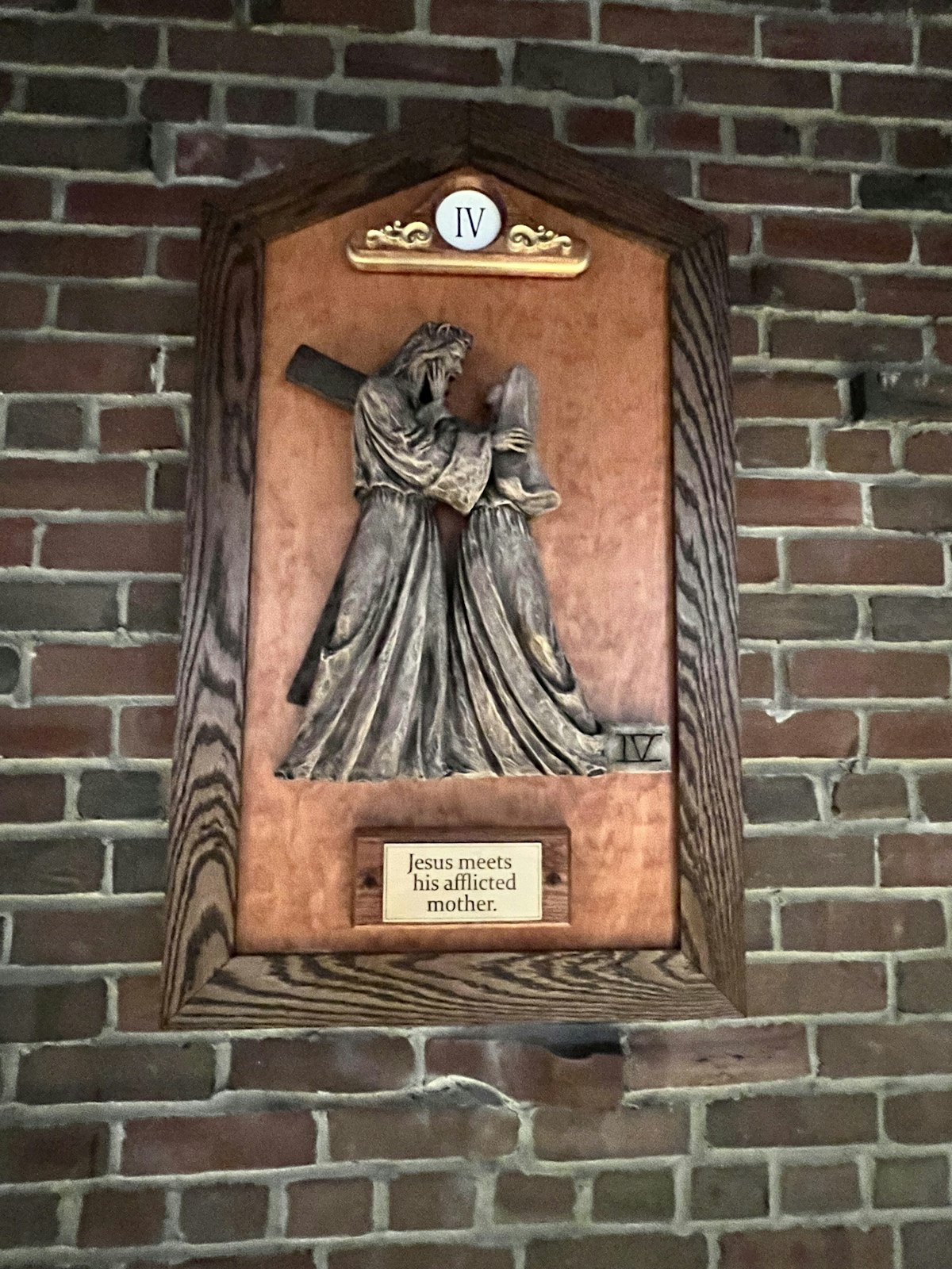 The fourth Station of the Cross, "Jesus Meets His Afflicted Mother," by Suzanne Young, at St. John Fisher Chapel University Parish in Auburn Hills.