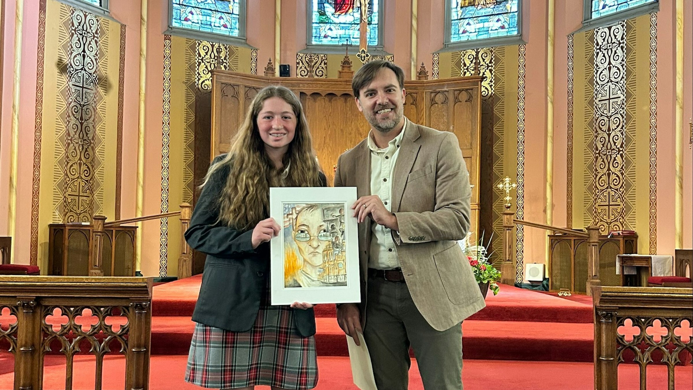 Father Gabriel Richard Guild announces winners of student art contest