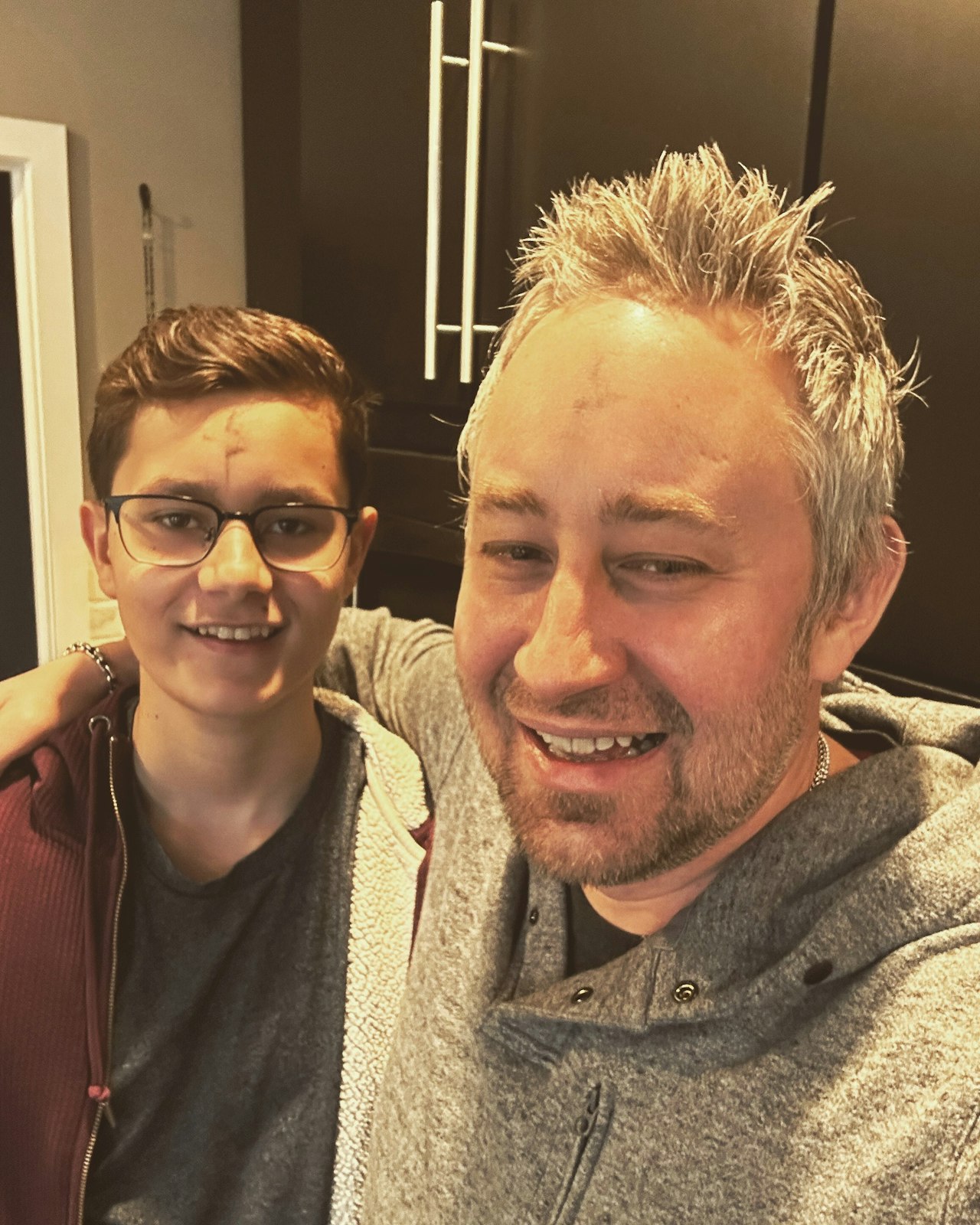 David Gardner and his son, Tyler, sport ashes on their foreheads on Ash Wednesday. The younger Gardner is currently in OCIA, preparing to be baptized during this year's Easter vigil.