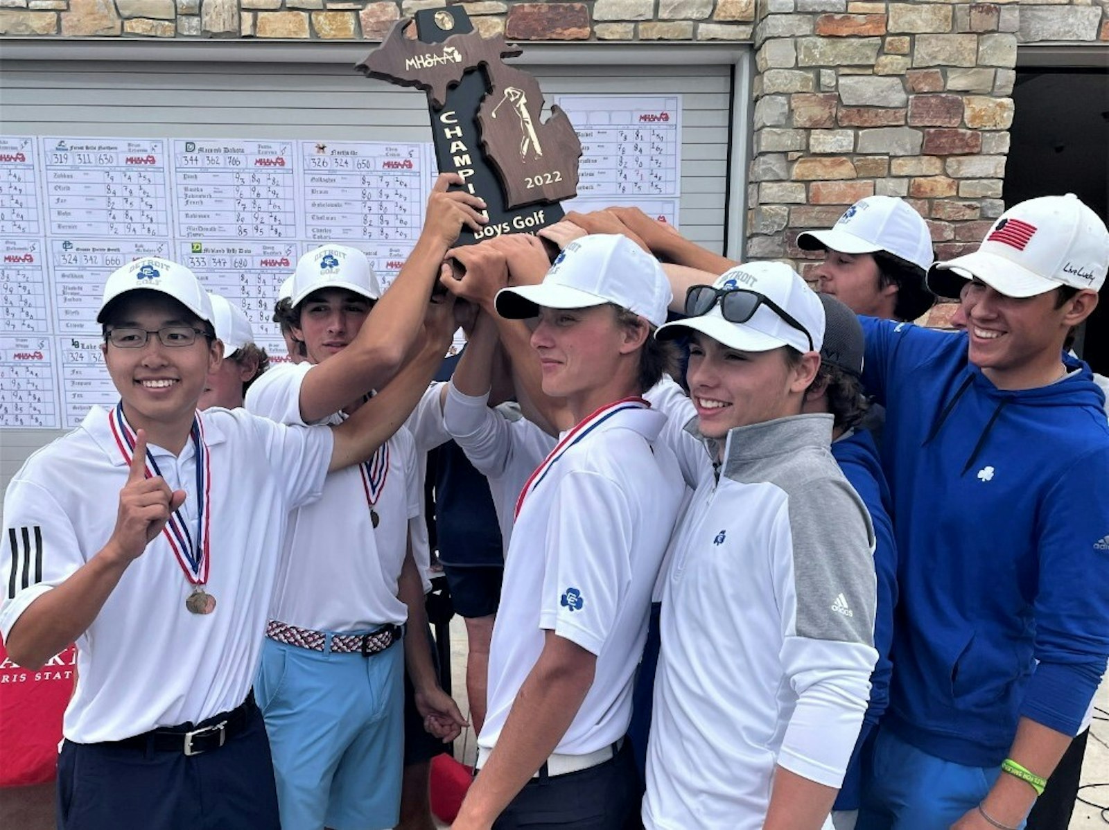 Novi Detroit Catholic Central celebrates its state golf championship. It took a late rally for the Shamrocks to finish ahead of Ann Arbor Skyline. (Photo courtesy of Detroit Catholic Central)