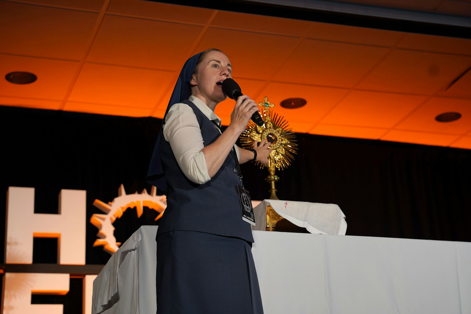 Sr. Tracey Matthia Dugas, FSP, speaks during the Holy Fire conference. Sr. Tracey invited two conference-goers to play a game of “Bible verse: Saint or Kanye?” in which a quote appeared on screen and the contestants guessed who said it.