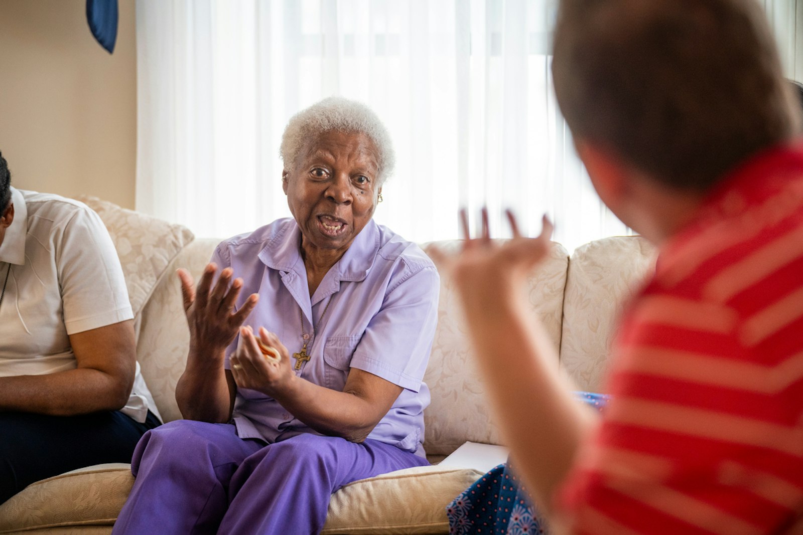 Sr. Elizabeth Harris, HVM, said she discovered the Home Visitors of Mary after observing sisters from the community going door to door dropping off flyers about St. George Church. She visited the church one morning, and said she felt the "presence of God" speak to her.