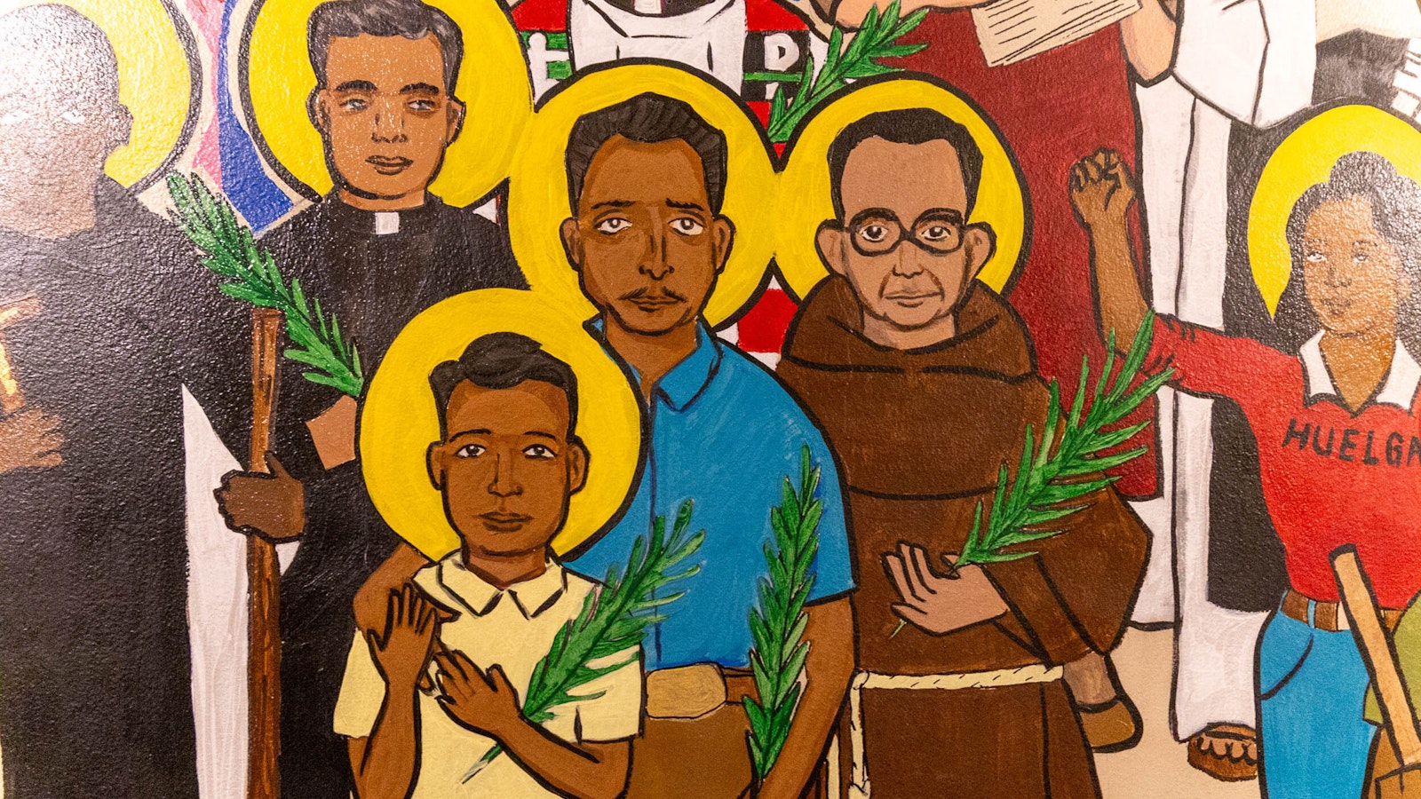 The individuals pictured on the mural represent the diversity of the southwest Detroit community.