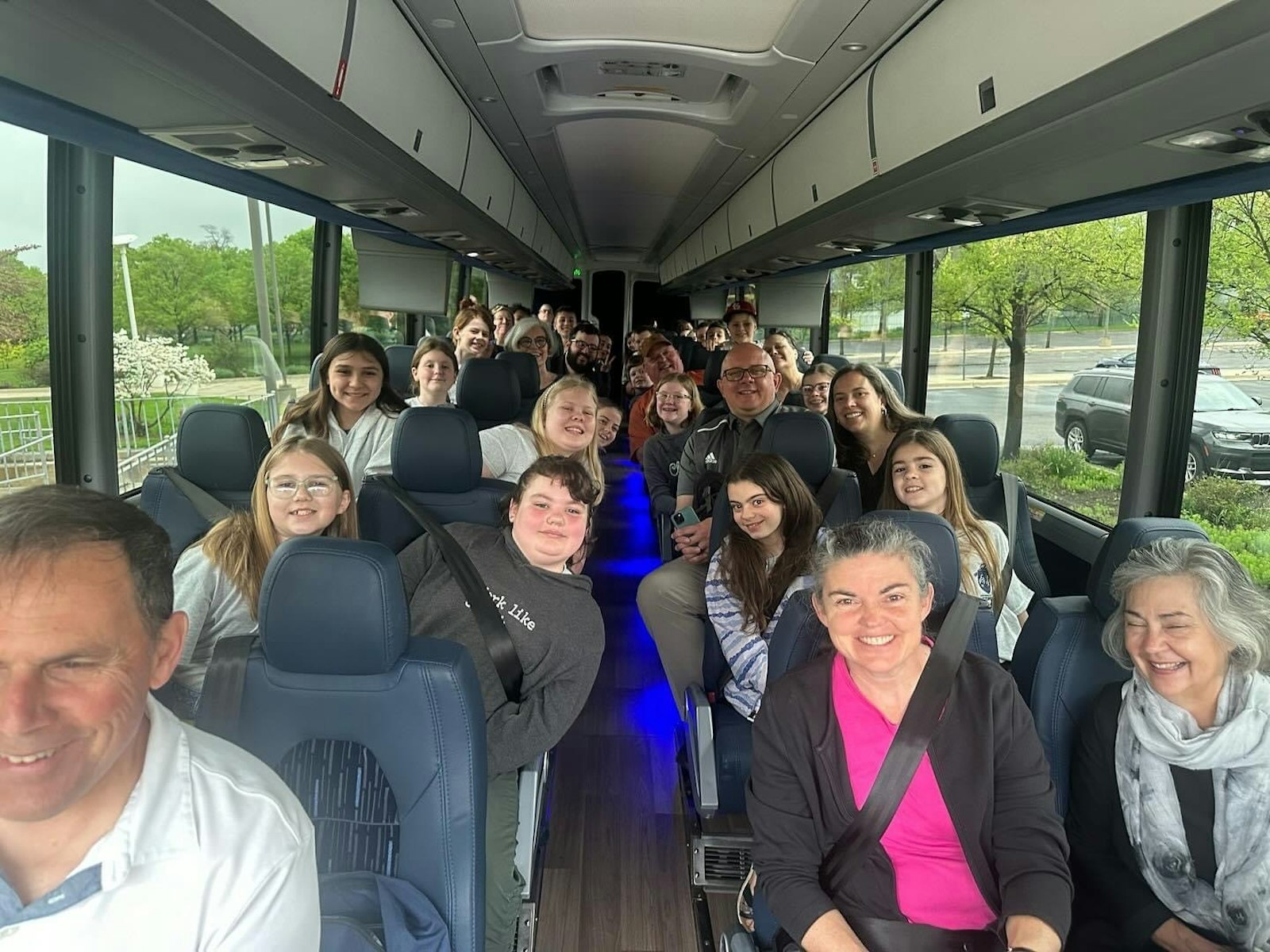 Choir members board the bus headed for Indiana. The choir's season will conclude Sunday, June 2, during the Solemnity of Corpus Christi at the Cathedral of the Most Blessed Sacrament in Detroit.