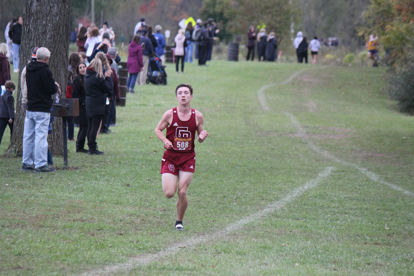 The second-place runner is barely in sight as Riverview Gabriel Richard junior Alex Meszaros cruises to the finish line.