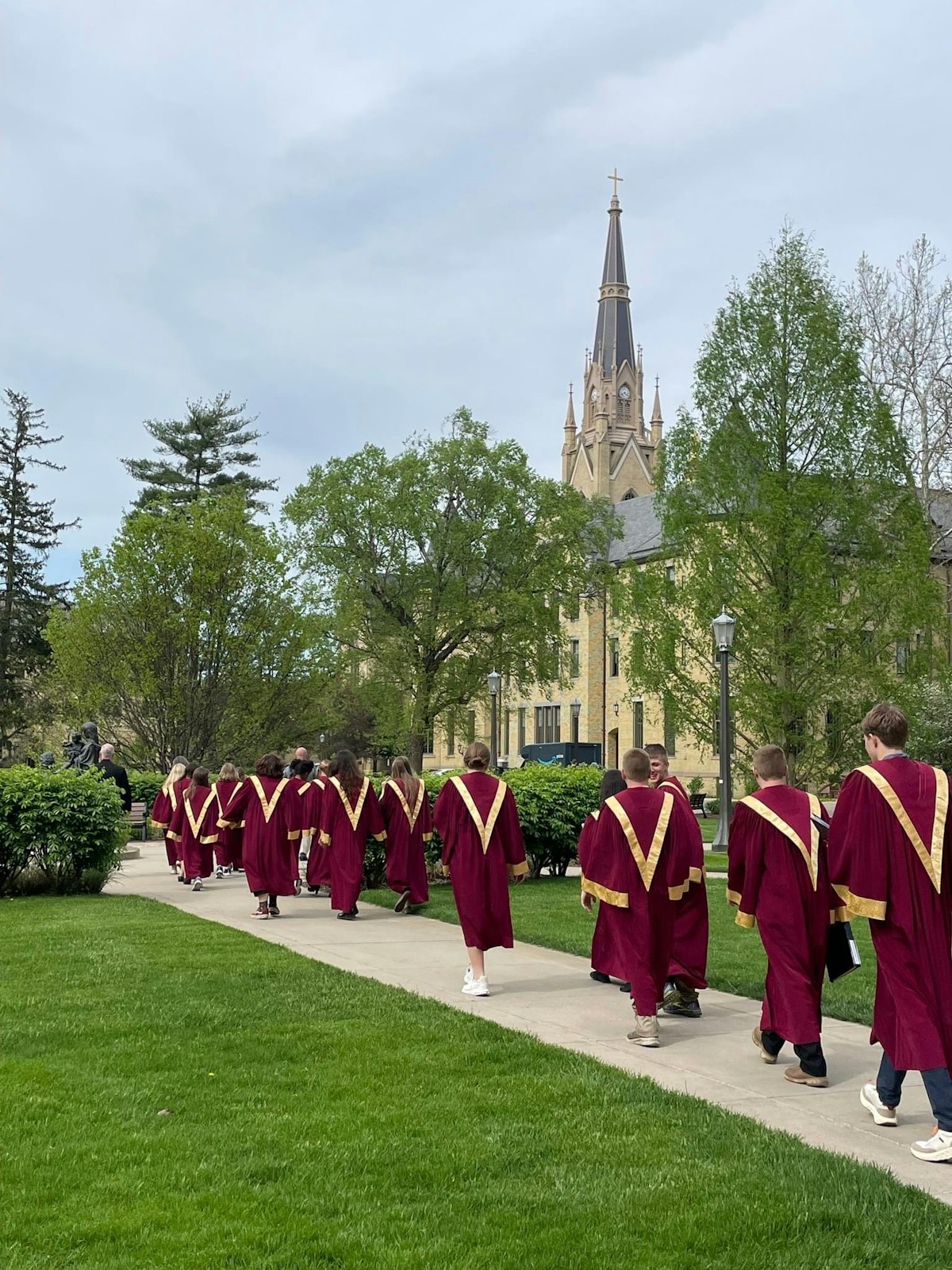 Choir members process to the basilica on Notre Dame's beautiful campus.