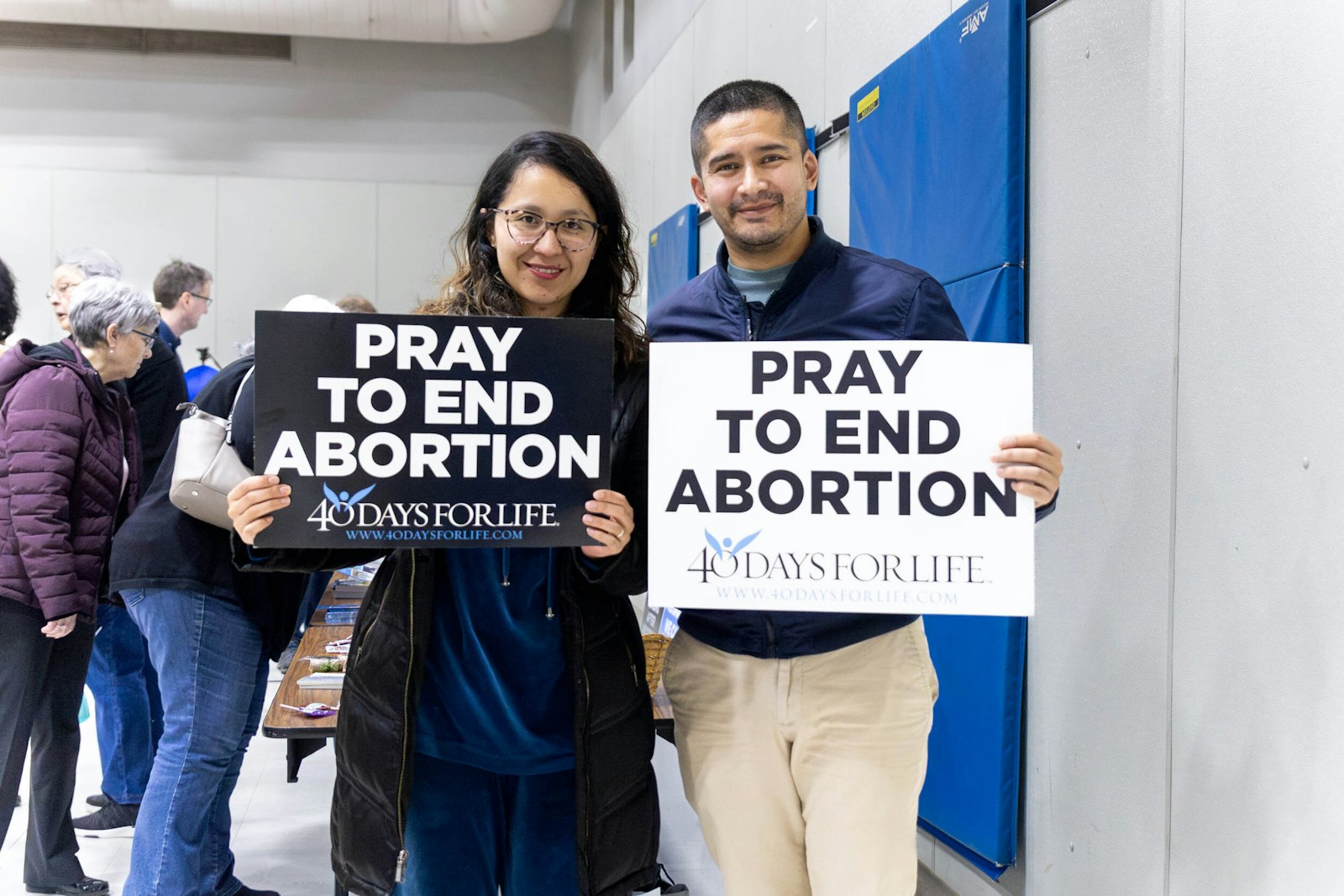 Volunteers hold signs used during the peaceful prayer vigil as part of the 40 Days for Life campaign in Ferndale. Volunteers can sign up for timeslots to participate in prayerful, silent witness.