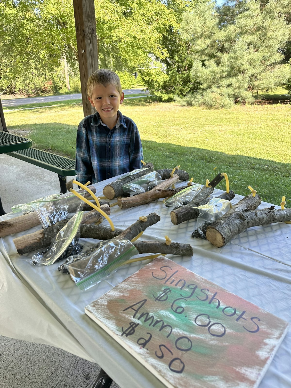 A youngster sells his slingshots during the North Branch Junior Makers Market.