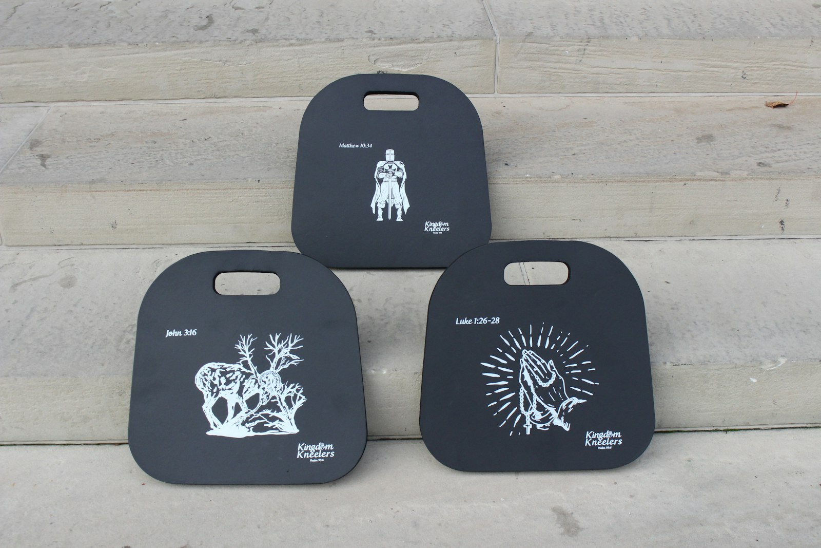 Kingdom Kneelers sell for $19.99 online and feature three designs: A ram caught in a thicket, hands in a prayer posture wrapped in a rosary, and a Crusader. Mullins and Turek wanted the designs to be specifically Catholic, while avoiding designs upon which it would be disrespectful to kneel.