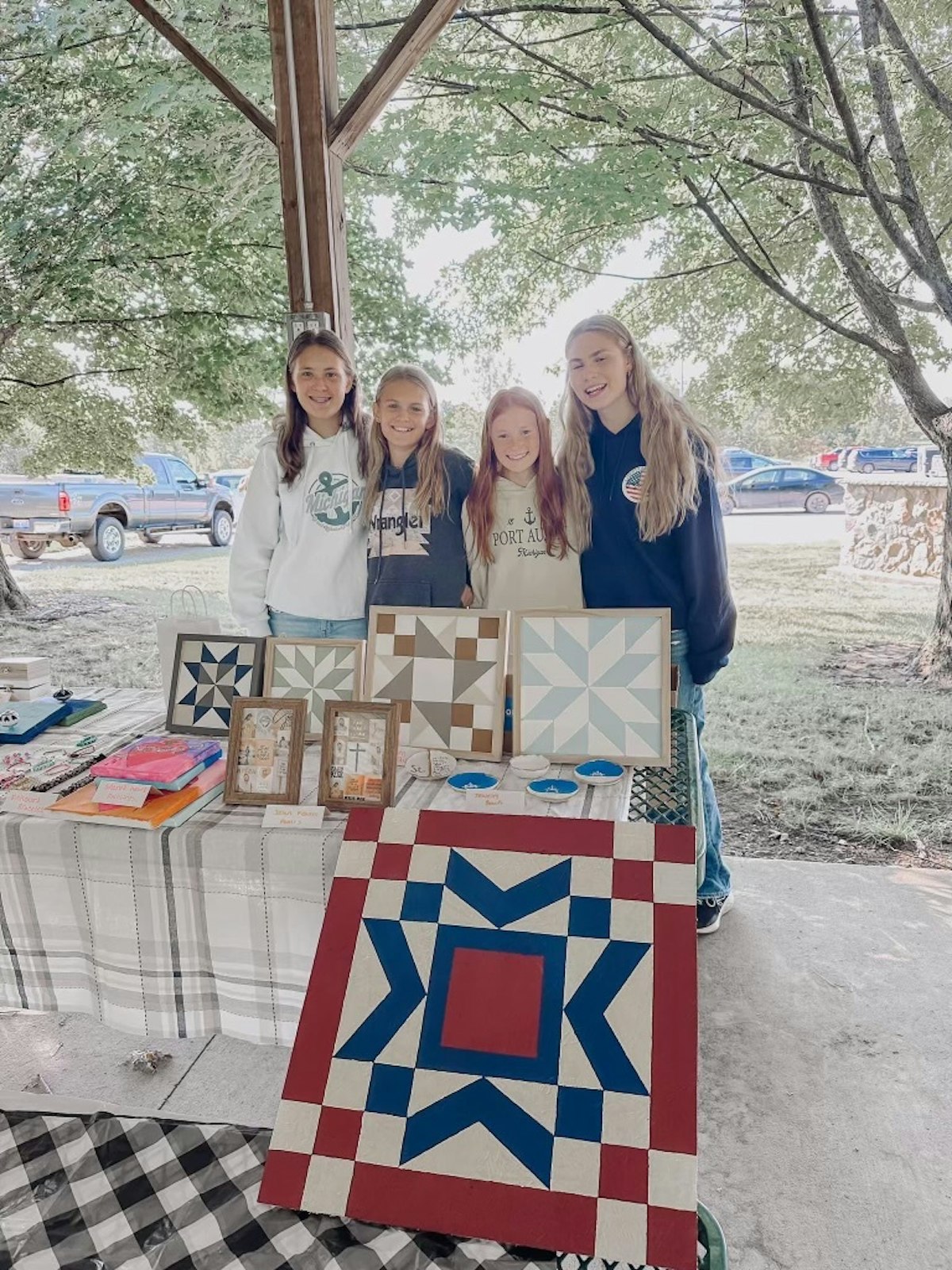 Young parishioners show off their wares during the Sept. 8 Junior Makers Market at SS. Peter and Paul Parish in North Branch.