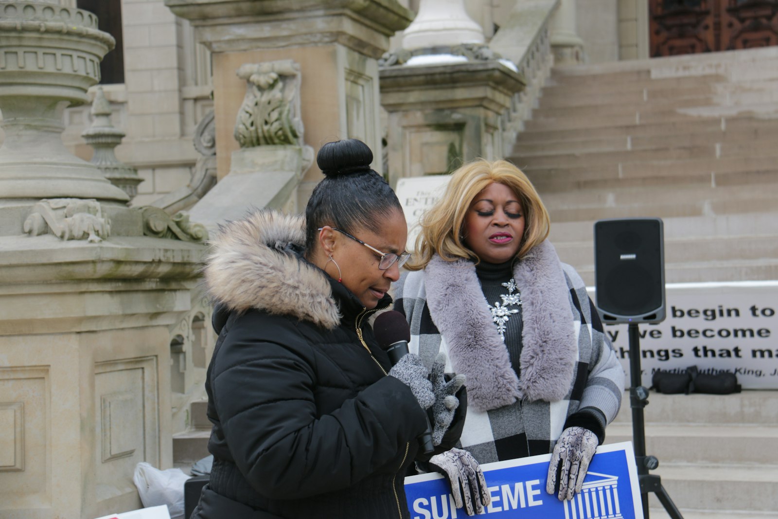 Monica Galloway of Flint and She Leads Michigan, along with Linda Lee Tarver of Lansing, and also She Leads Michigan, speak during a pray rally before the Michigan Capitol.