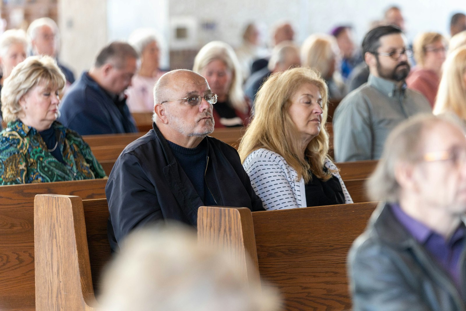 Current and former parishioners gathered to celebrate their parish's anniversary and history as Archbishop Vigneron encouraged those in attendance to offer the parish's history back to God.