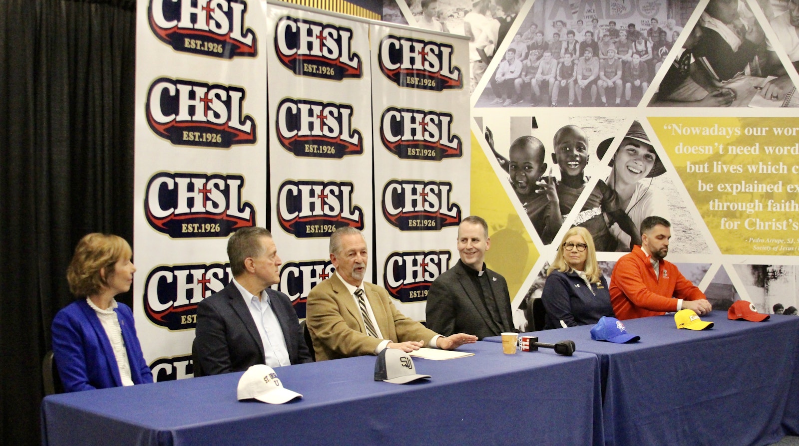 Catholic High School League director Vic Michaels (third from left) was joined by the leaders of the five Toledo-based Catholic schools at Tuesday morning’s press conference, held at the Iott Center at St. John’s Jesuit High School. (Jamison Terbrack-SJJ | Special to Detroit Catholic)