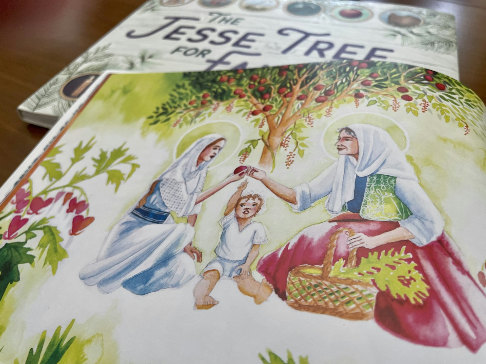 In the "Marian Consecration for Families with Young Children," Pressprich included an illustration of a Jesse Tree behind Mary and Elizabeth. The illustration inspired her to write another book.