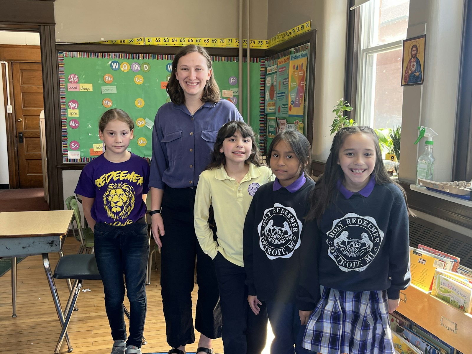 Sarah Niekamp volunteers as a teacher’s aide for the third-grade class at Holy Redeemer School. She is one of four young women on the SOLT missionary volunteer team for Detroit.