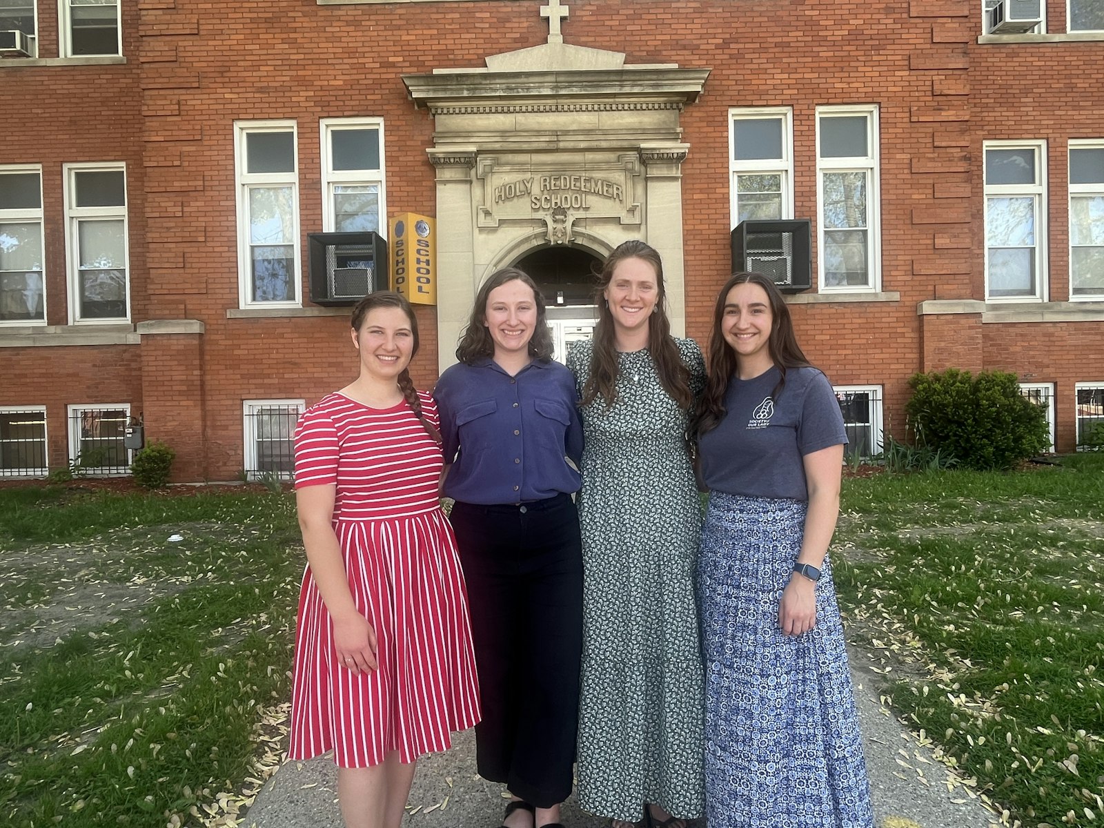 Left to right, Brianna Moreland, Sarah Niekamp, Claire McElroy and Bernadette Re serve as SOLT missionary volunteers at Holy Redeemer Catholic School in Detroit.