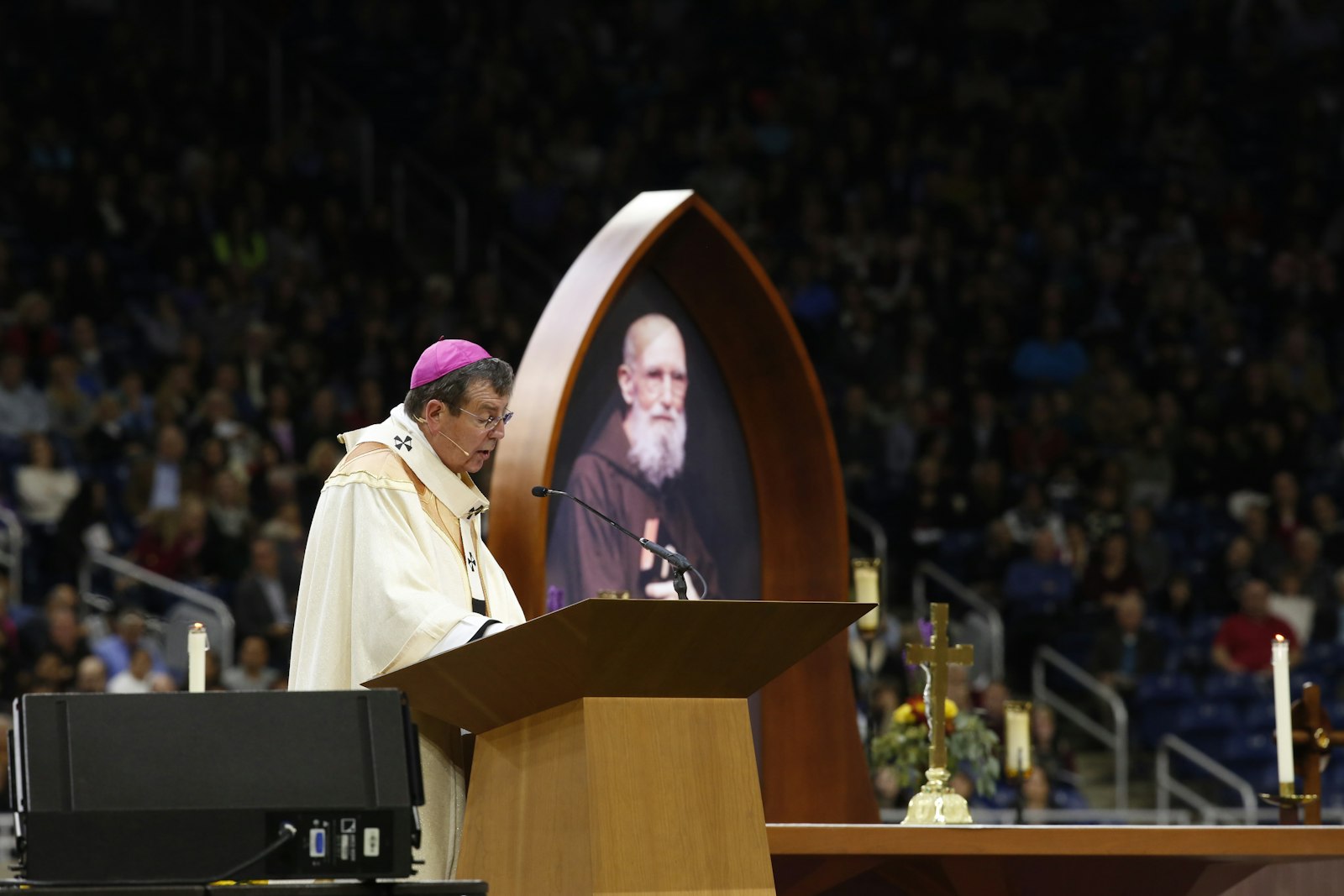 Before 65,000 people gathered at Detroit's Ford Field on Nov. 18, 2017, Archbishop Vigneron asks Cardinal Angelo Amato, prefect of the Vatican's Congregation for the Causes of Saints and the representative of Pope Francis, to declare Detroit's Fr. Solanus Casey a "blessed" of the Church, just the second U.S.-born man to be beatified. (Jeff Kowalsky | Special to The Michigan Catholic)