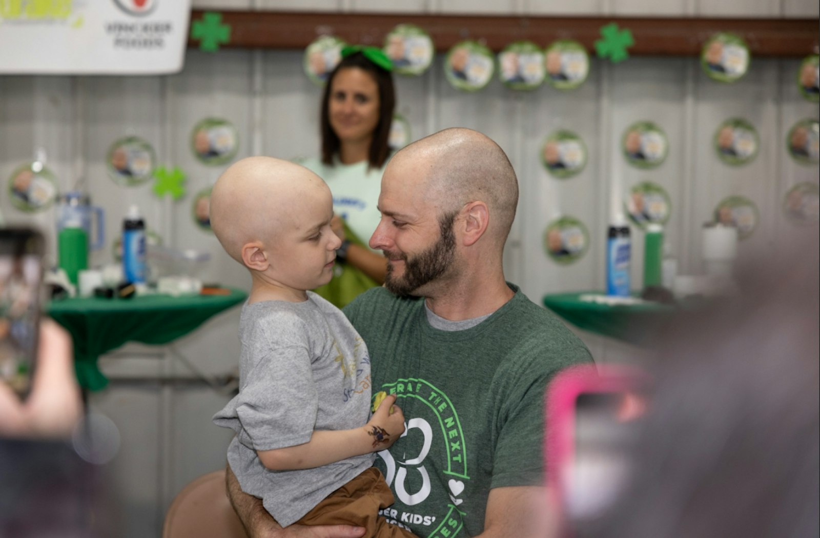 David Jones is pictured after shaving his head with his son, Carson, who last year was diagnosed with leukemia and is currently undergoing chemotherapy.