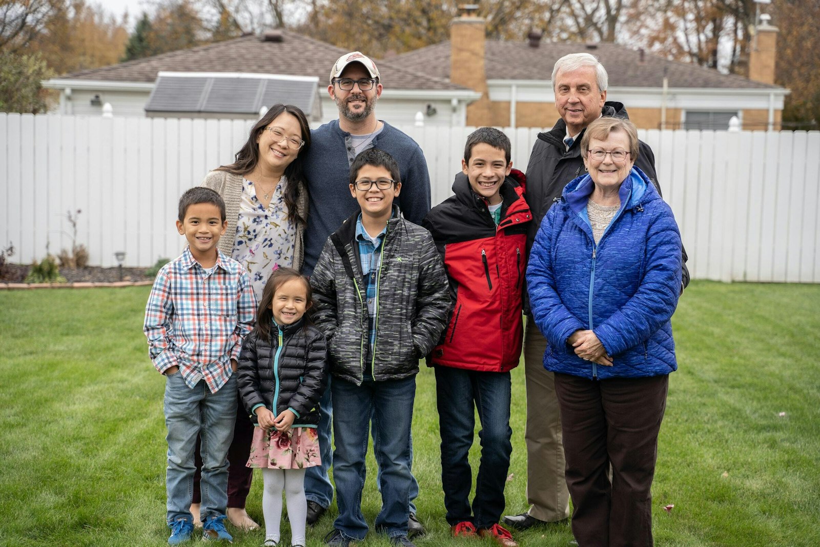 Nicole Joyce, left, is pictured with her family in 2019. Joyce, associate director of family ministry for the Archdiocese of Detroit, said Compass was developed after the archdiocese began fielding calls from parents during the pandemic with questions about how to talk to their children about the faith.