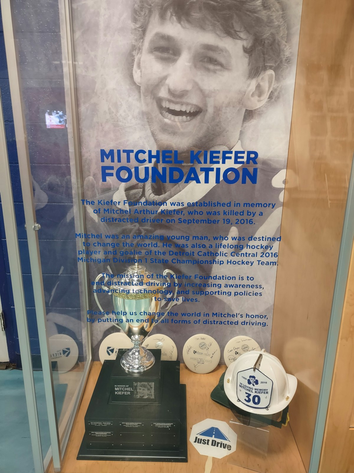 Mitchel Kiefer was only a few months past his graduation from Novi Detroit Catholic Central when hit by a distracted driver on the way to Michigan State University in East Lansing. A showcase at U.S.A. Hockey Arena is dedicated to his memory.