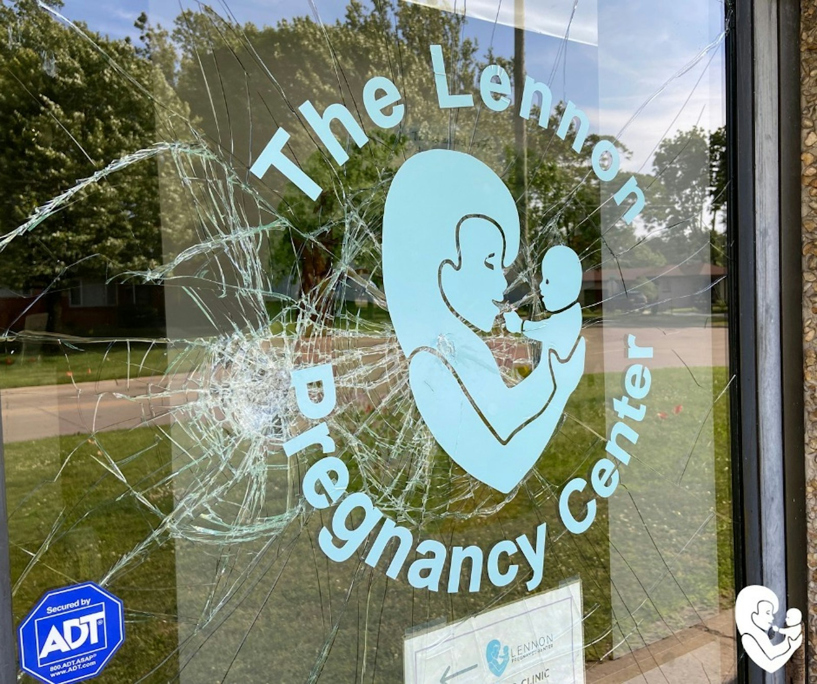 Vandals smashed nearly a dozen windows and spray-painted messages on the side of the building at the independent Lennon Pregnancy Center in Dearborn Heights on June 20. One of the messages, which has since been painted over, read, "If abortion isn't safe, neither are you." (Photos courtesy of Lennon Pregnancy Center)