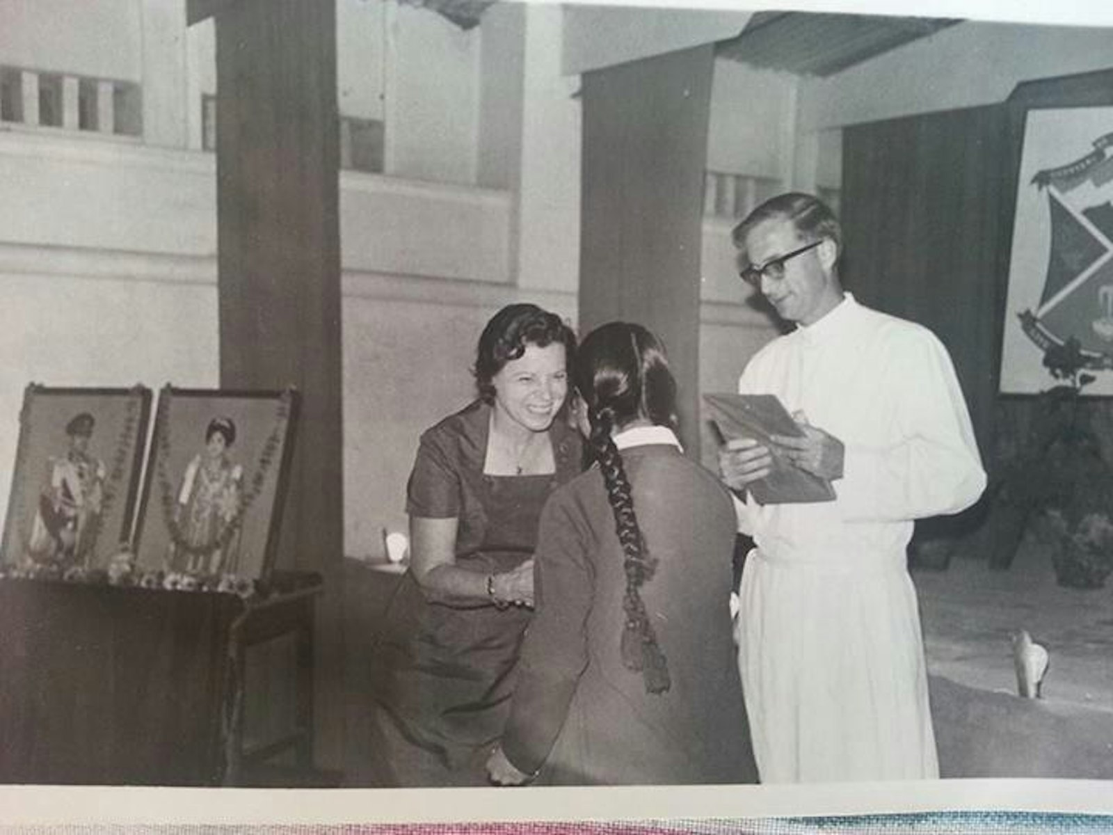 A young Fr. Cachat in 1975, then principal of St. Xavier's School in Jawalakhel, hands out awards to students.
