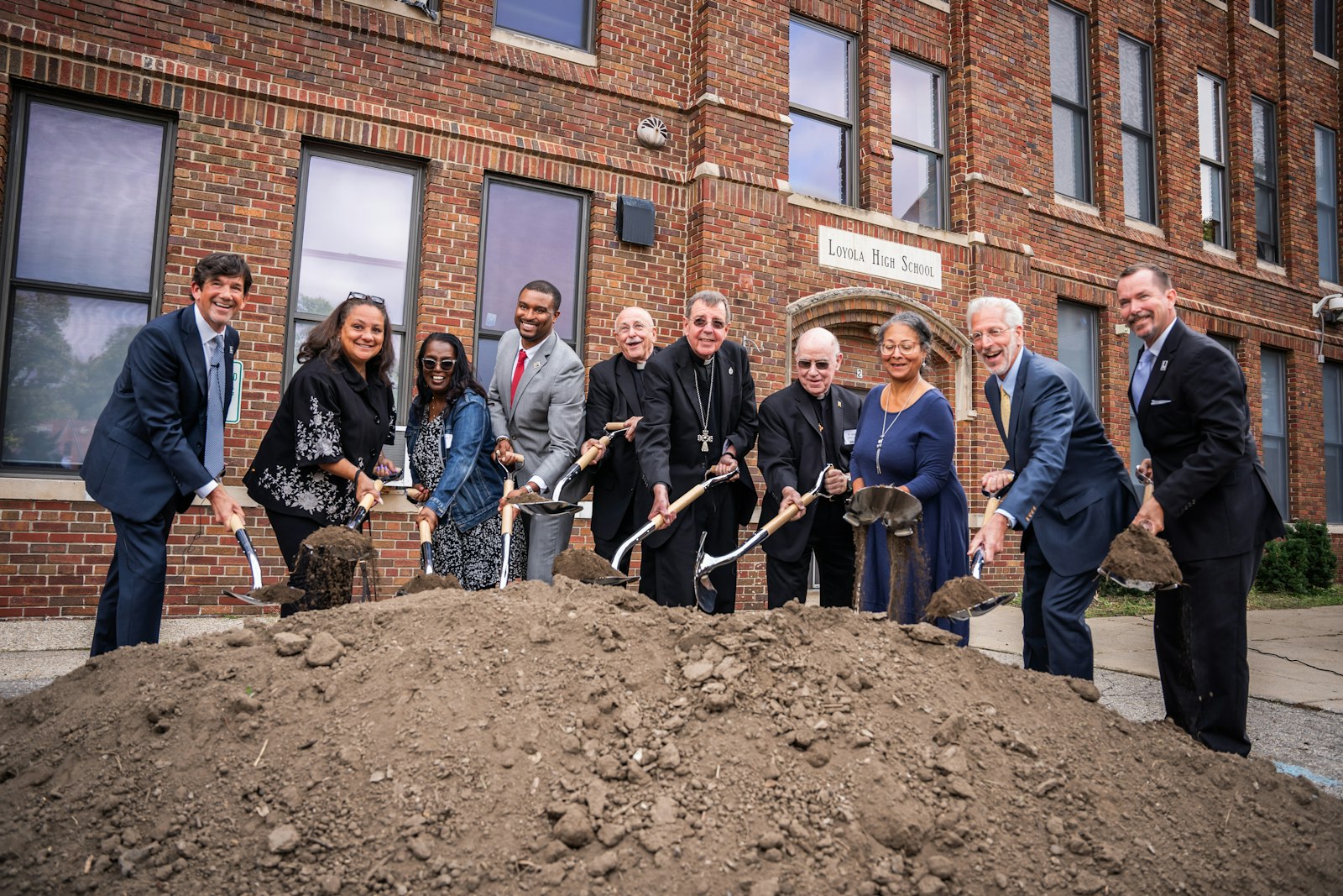 Representatives from Loyola High School, the Midwest Jesuits, Archdiocese of Detroit and the city of Detroit take part in a ceremonial groundbreaking Sept. 13 for Loyola's new St. Peter Claver Chapel, which will be the first new church or chapel built in the city of Detroit since the 1960s.