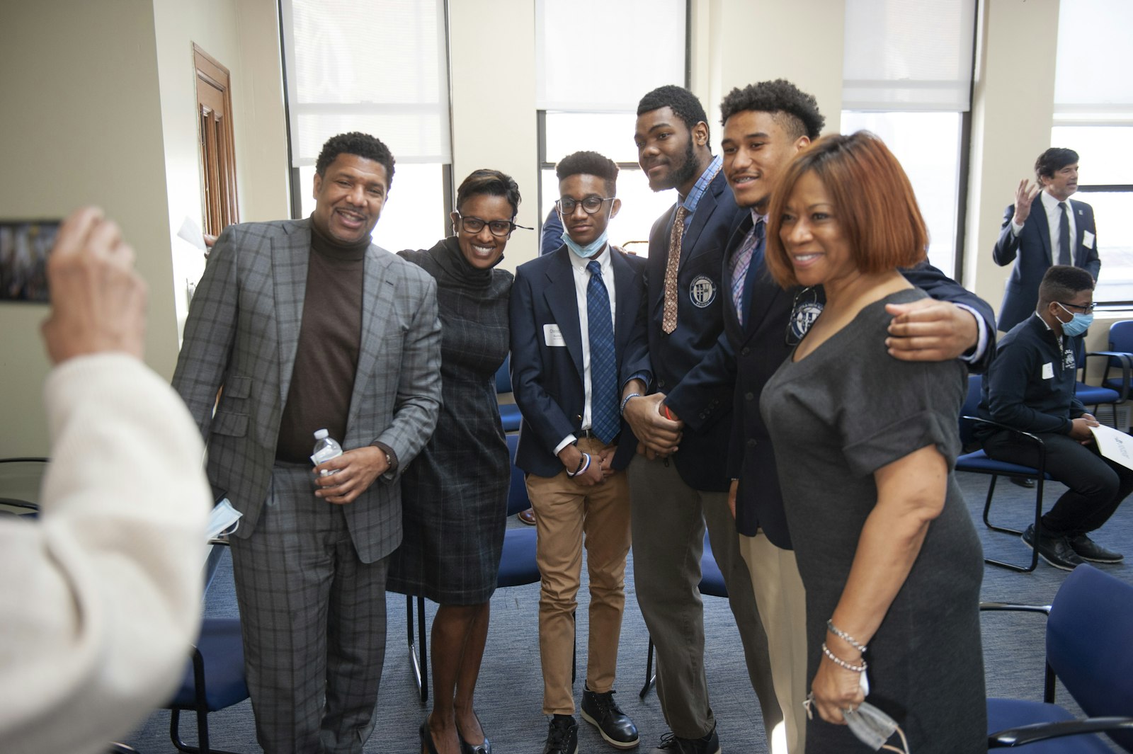 Loyola students, alumni and supporters take a photo during the scholarship announcement event Feb. 14. Loyola holds students to high standards, said Wyatt Jones III, but provides opportunities for students to meet their potential.