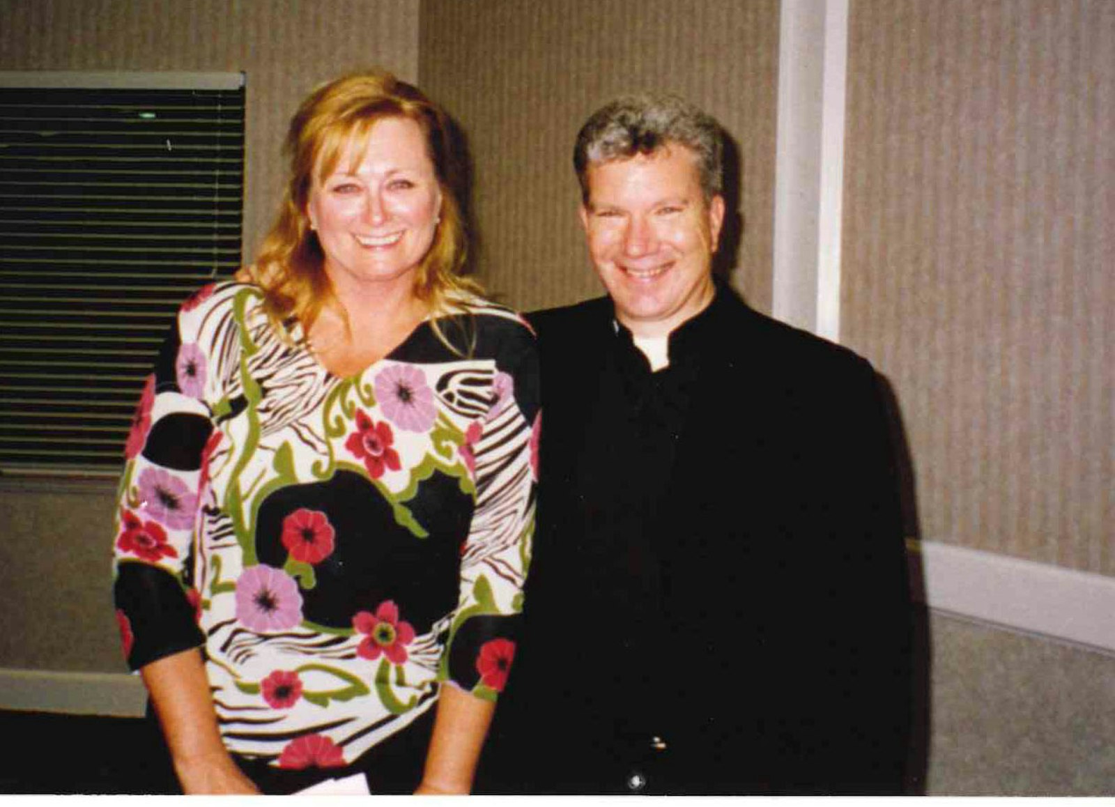 Linda Maccarone, left, former office manager at St. Therese of Lisieux Parish in Shelby Township, smiles with then-Msgr. Jeffrey Monforton, who served as pastor of the parish from 2005-06. (Courtesy of Linda Maccarone)