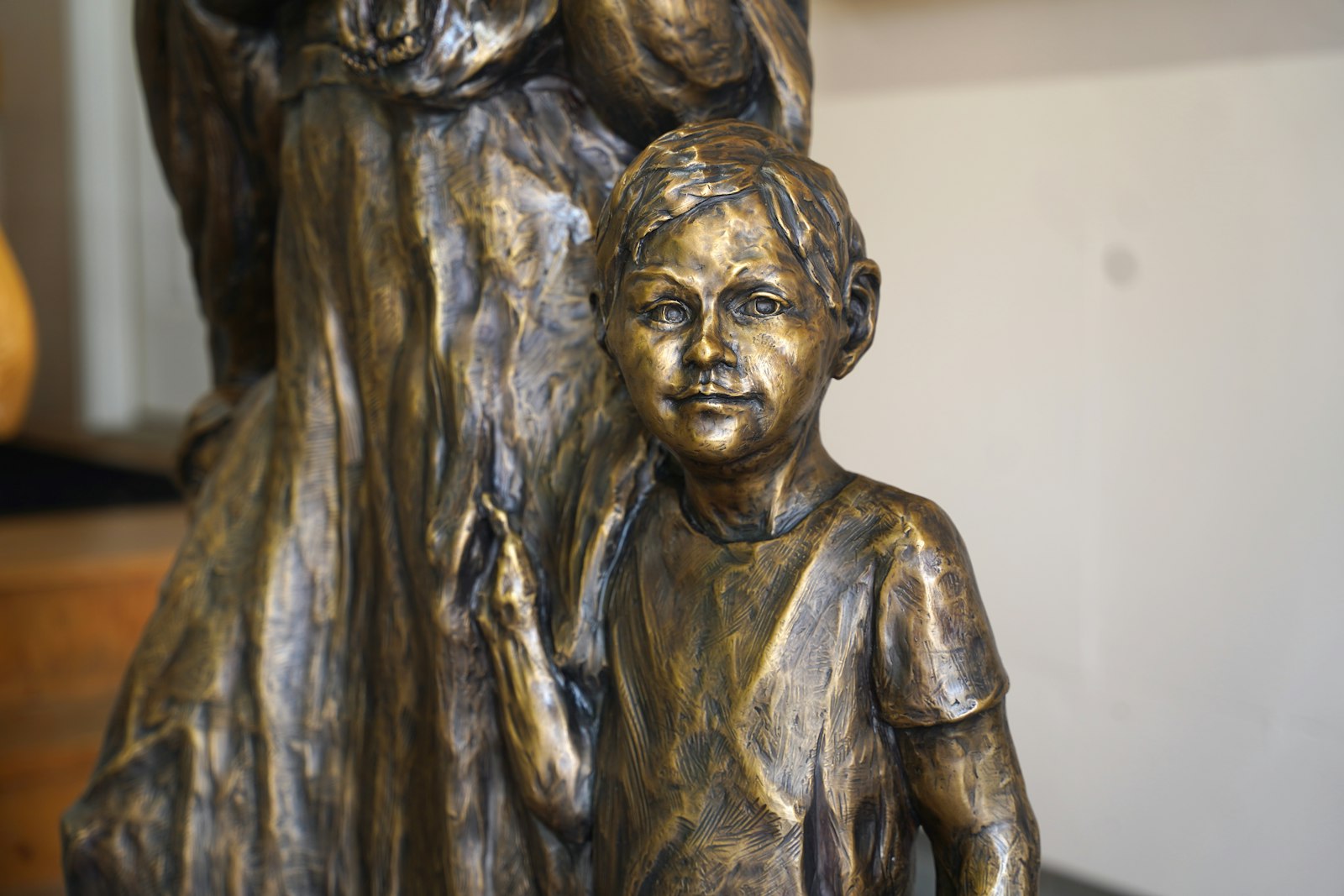 A young boy is depicted tugging on Mary's mantle. The 5-foot-7 statue is meant to visualize the Blessed Mother's concern for all in her care, including victims of abortion, human trafficking and abuse. (Daniel Meloy | Detroit Catholic)