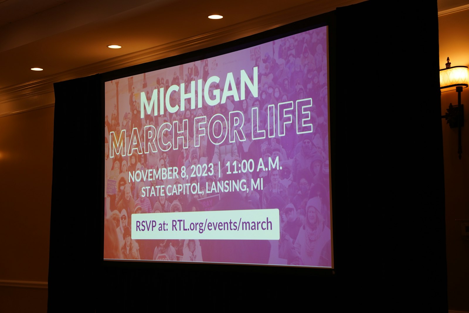 Details of the Michigan March for Life, which will take place Nov. 8 at the Michigan state capitol in Lansing, are pictured on a projector screen.