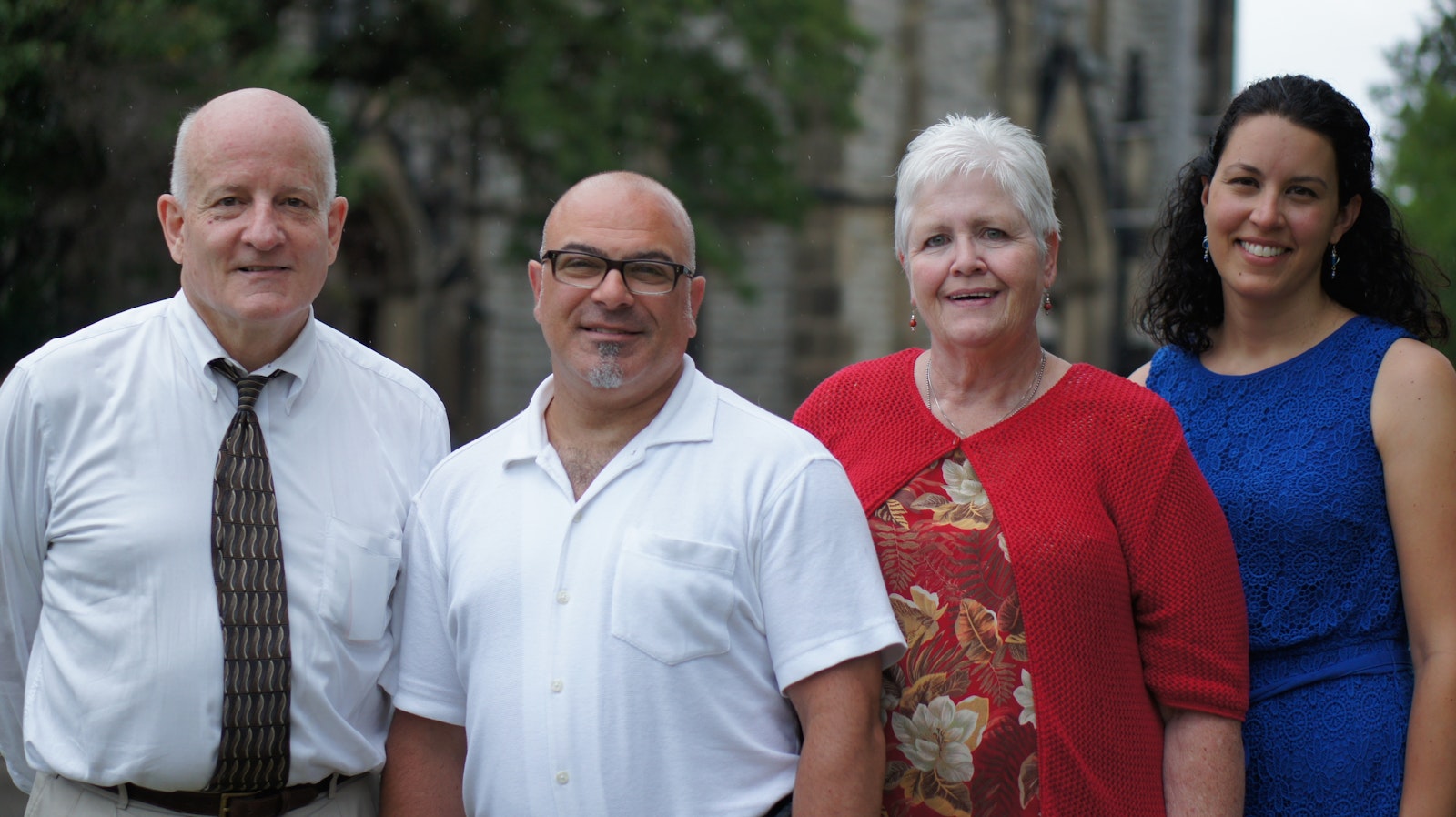 Detroit Mass Mob organizers, left to right, Thom Mann, Anthony Battaglia, AnnaMarie Barnes and Teresa Chisholm stand outside St. Joseph Church. Not pictured is Jeff Stawasz. (Detroit Catholic archive photo)