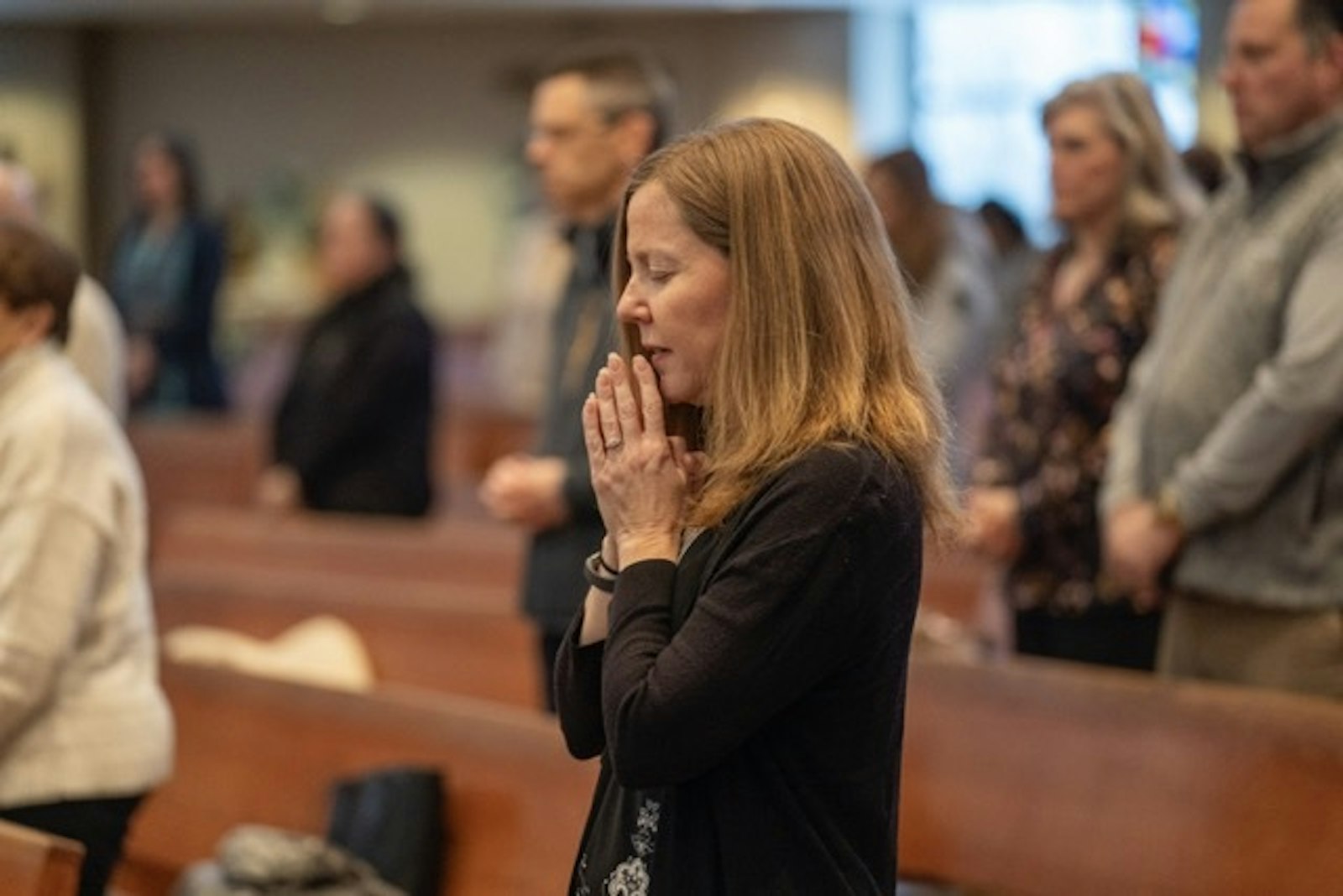 People pray for the protection of the unborn during a holy hour and Mass for life at Our Lady of Good Counsel Parish in Plymouth. (Photo by Valaurian Waller | Detroit Catholic)