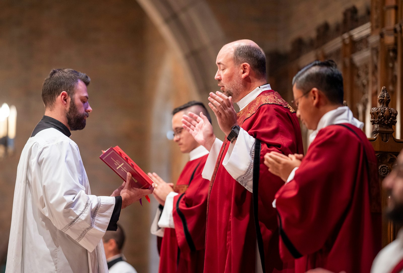 Fr. Stephen Burr, rector and president of Sacred Heart Major Seminary, prays during the opening Mass of the academic year on Sept. 3 inside Sacred Heart's chapel.