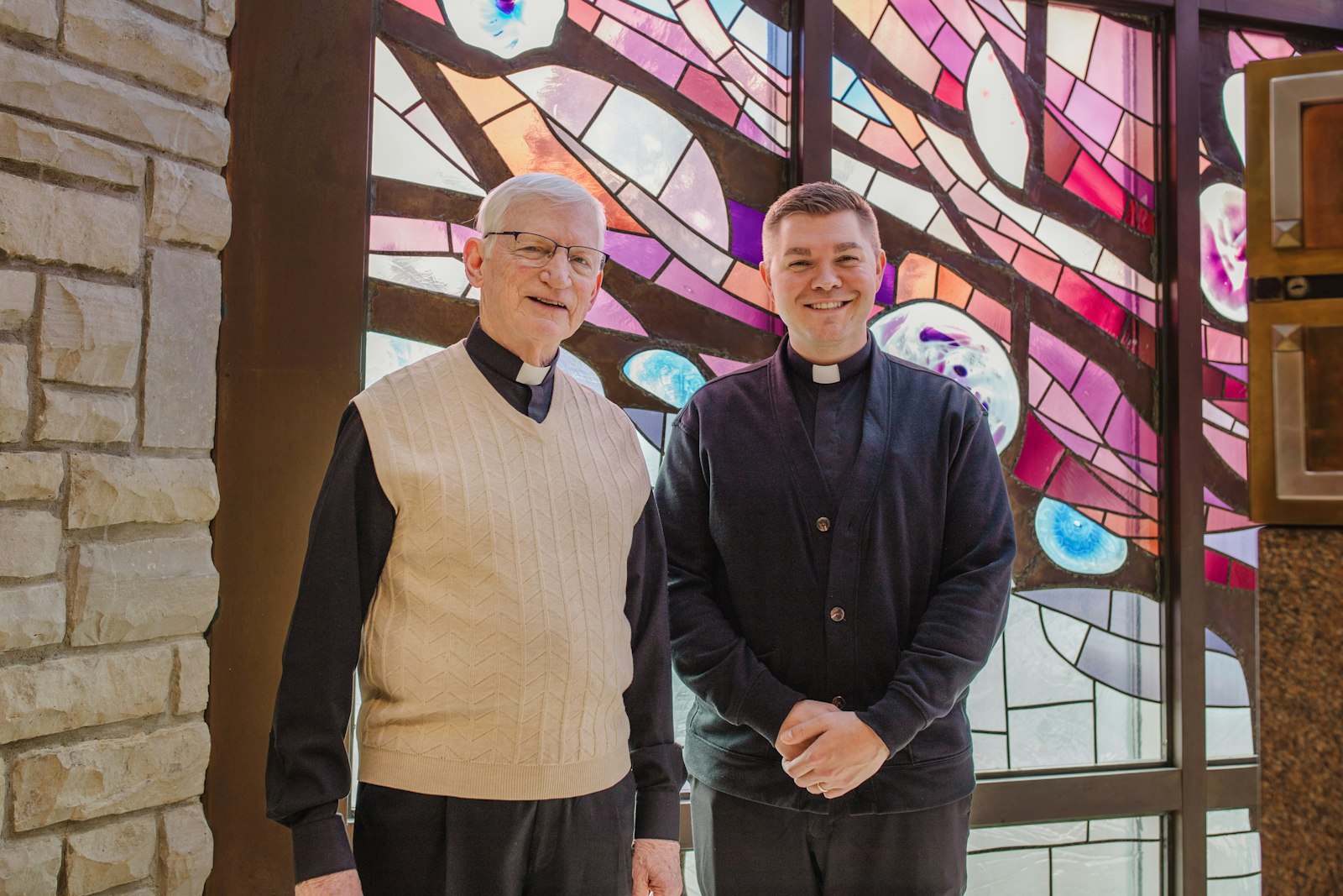 Msgr. Gerald McEnhill, left, established the Msgr. Gerald A. McEnhill Business Education Fund for Priests, which he hopes will help priests like Fr. Adam Nowak, right, and others learn and apply the skills he found valuable over his five-decade ministry. As a young priest, Msgr. McEnhill pursued a master's degree in business at his own expense, learning tools he found useful time and again as a parish leader.