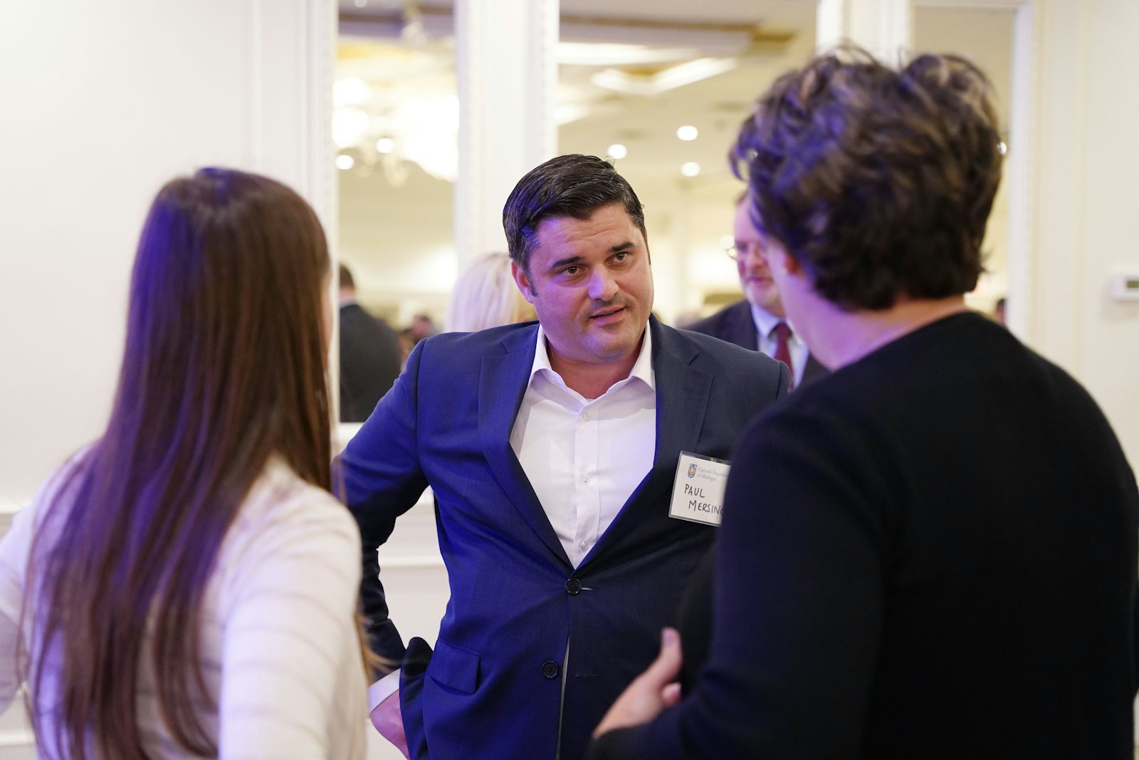 Paul Mersino, a member of the St. Margaret of Castello Granting Fund's board of directors, speaks with benefactors July 19 during an event to support the new initiative at Penna's of Sterling in Sterling Heights. (Daniel Meloy | Detroit Catholic)