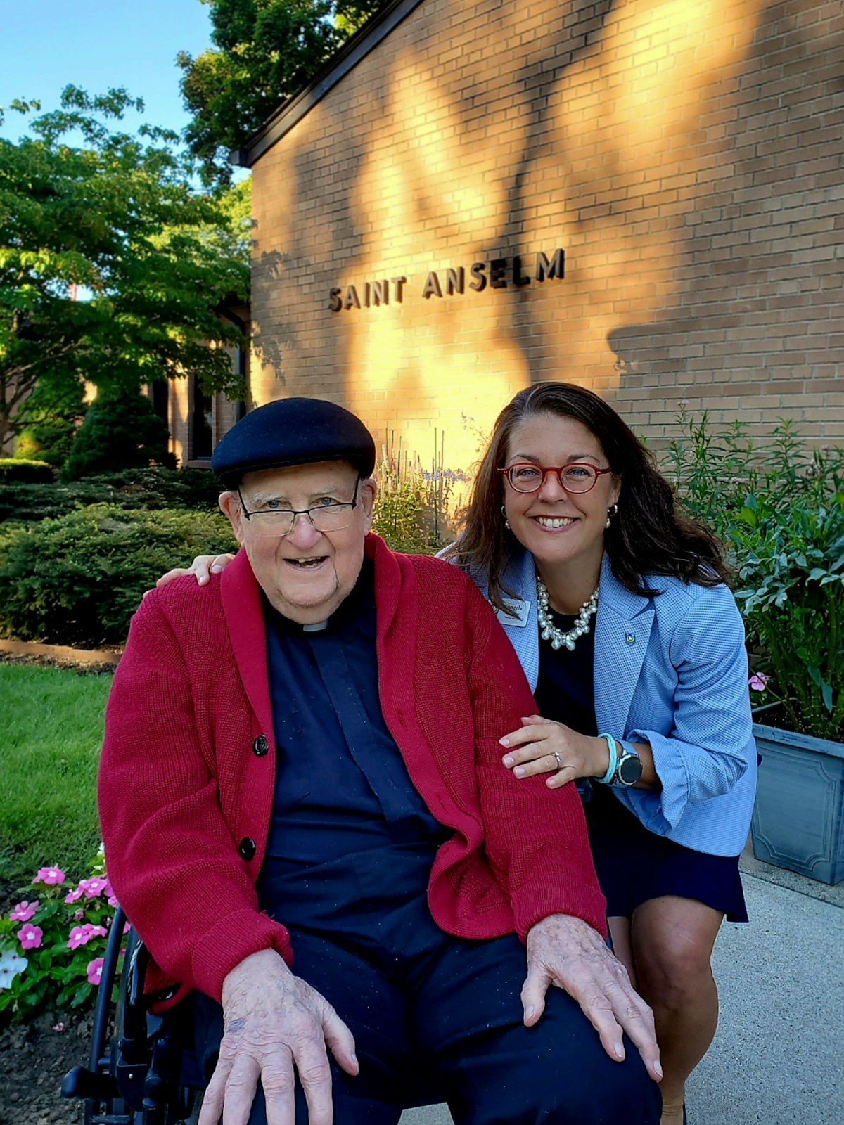 Msgr. James Moloney with his niece, Angela Moloney, president and CEO of the Catholic Foundation of Michigan. Angela Moloney said Msgr. Moloney was a big inspiration for her and her entire family, with his steadfast commitment to missions around the world and St. Anselm Parish in Dearborn Heights. (courtesy photo)