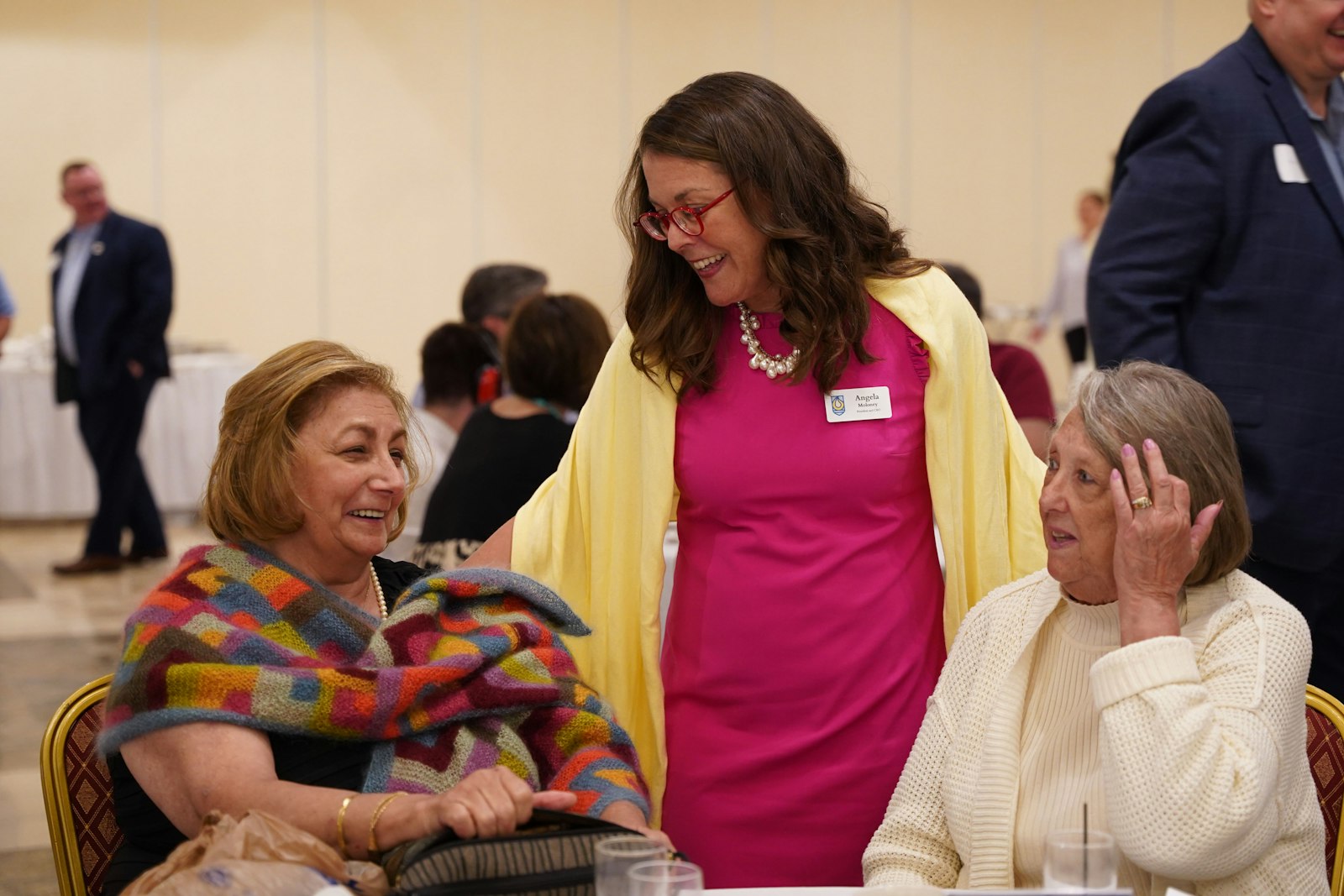 Catholic Foundation of Michigan president and CEO Angela Moloney, center, talks with benefactors during the July 19 event. Moloney said the St. Margaret of Castello Granting Fund seeks to allow Catholic schools to overcome the twin obstacles of funding and expertise as it provides tools to allow schools to better serve students with special needs. (Daniel Meloy | Detroit Catholic)