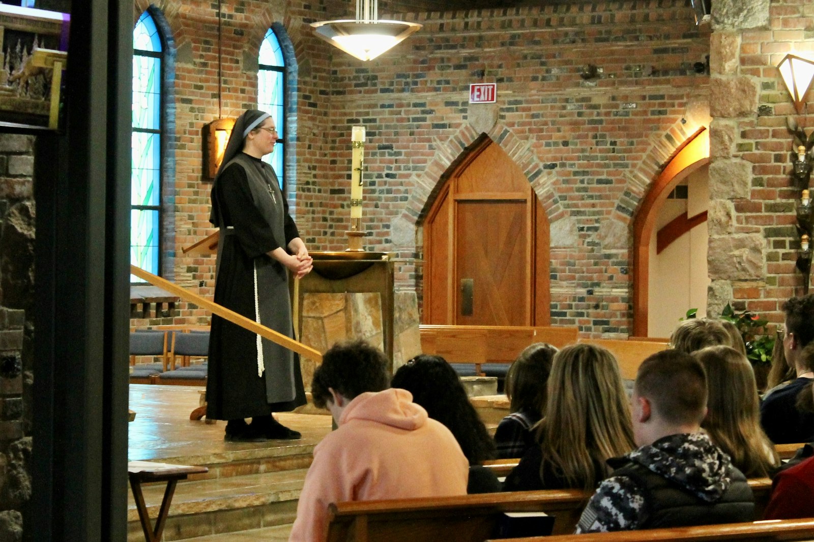 Sr. Mary Gianna Thornby, DLJC, a survivor of the 1999 school shooting at Columbine High School in Colorado, speaks to Oxford High School students at St. Joseph Parish in Lake Orion on March 13. Sr. Mary Gianna was invited to tour Oxford High School, where prayer is "becoming a bit more normal," Johnson said. (Gabriella Patti | Detroit Catholic)