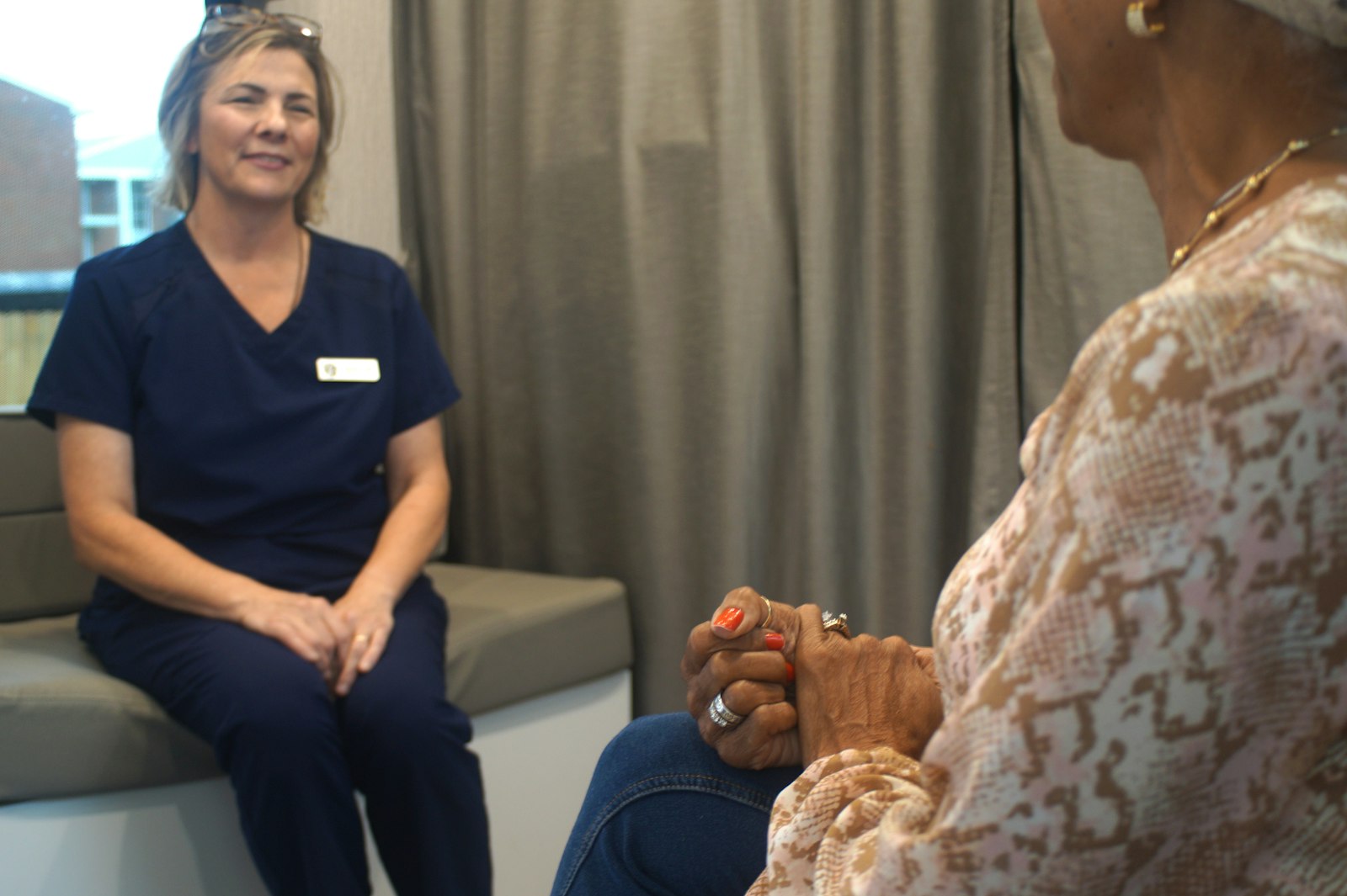 Nurse Alanha Asher counsels a women inside the new Pregnancy Help Clinic Mobile Medical Unit, which is ready to be deployed once a sonographer is hired.