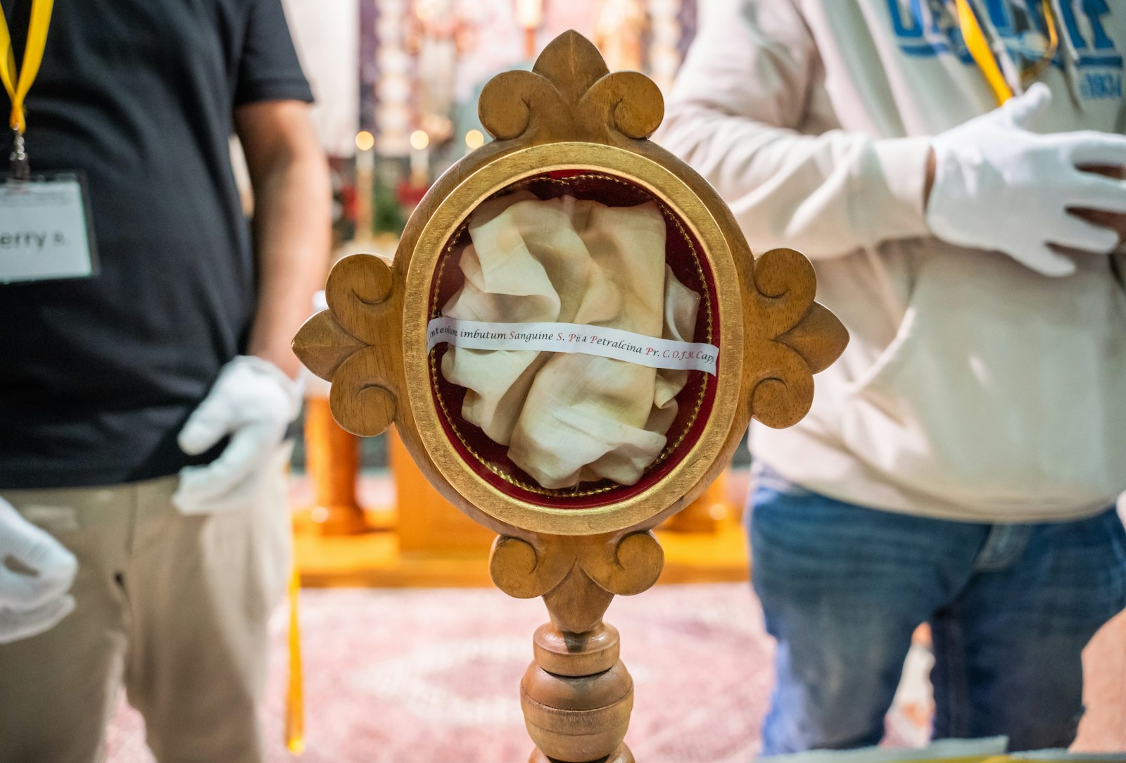 A handkerchief bearing St. Padre Pio's sweat hours before he died was one of five relics available for veneration at St. Barbara Parish. (Valaurian Waller | Detroit Catholic)
