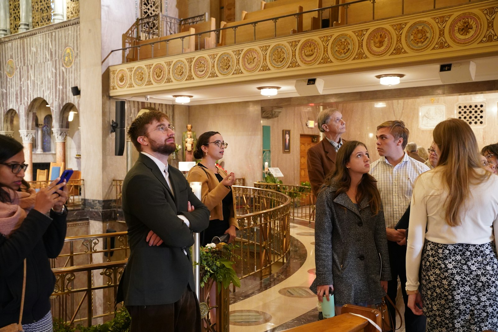 St. Aloysius parishioner Pilar Renneker gives a tour of St. Aloysius Parish after Mass. St. Aloysius Parish was founded in 1973, but the current church was built in 1930.