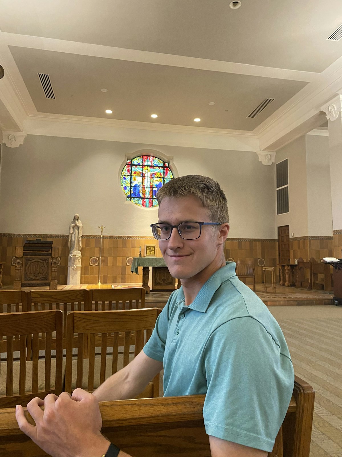 Walter Plymale is pictured in the Chapel of the North American Martyrs at University of Detroit Jesuit High School. Plymale said it's important to him to find a college where he can live out his Catholic faith. (Photo courtesy of Luke Fisher)