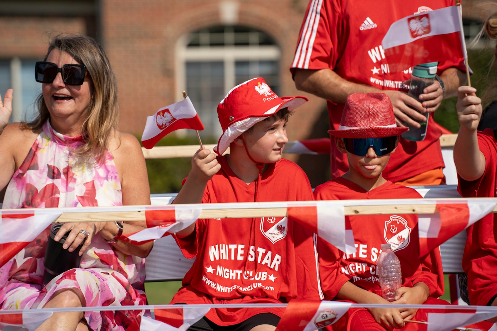 Spectators and parade participants were dressed in red and white striped clothing – the national colors of Poland – during the Poland Day 2024 parade in Warren.