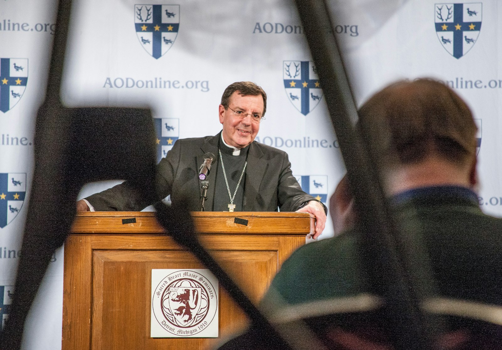 Archbishop Vigneron smiles broadly during a news conference at Sacred Heart Major Seminary in March 2013, as news broke that Cardinal Jorge Mario Bergoglio had been elected by the College of Cardinals and had chosen the name Pope Francis. (Larry A. Peplin | Special to The Michigan Catholic)